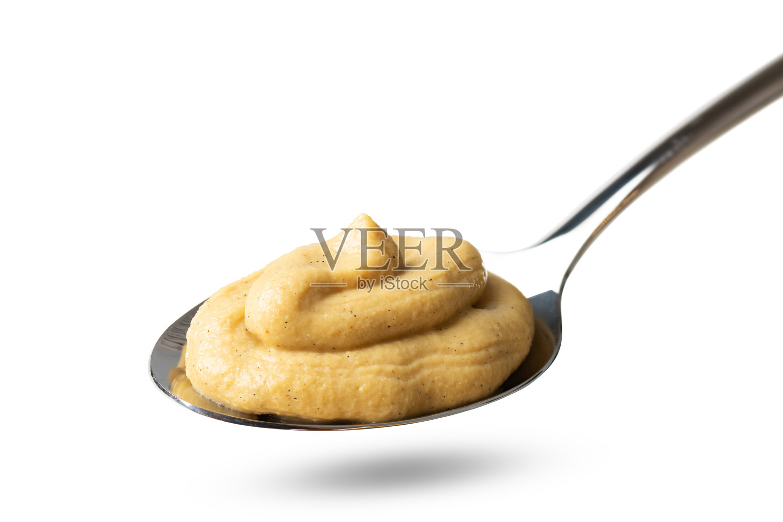 铁勺上的新鲜芥末孤立在白色背景上照片摄影图片