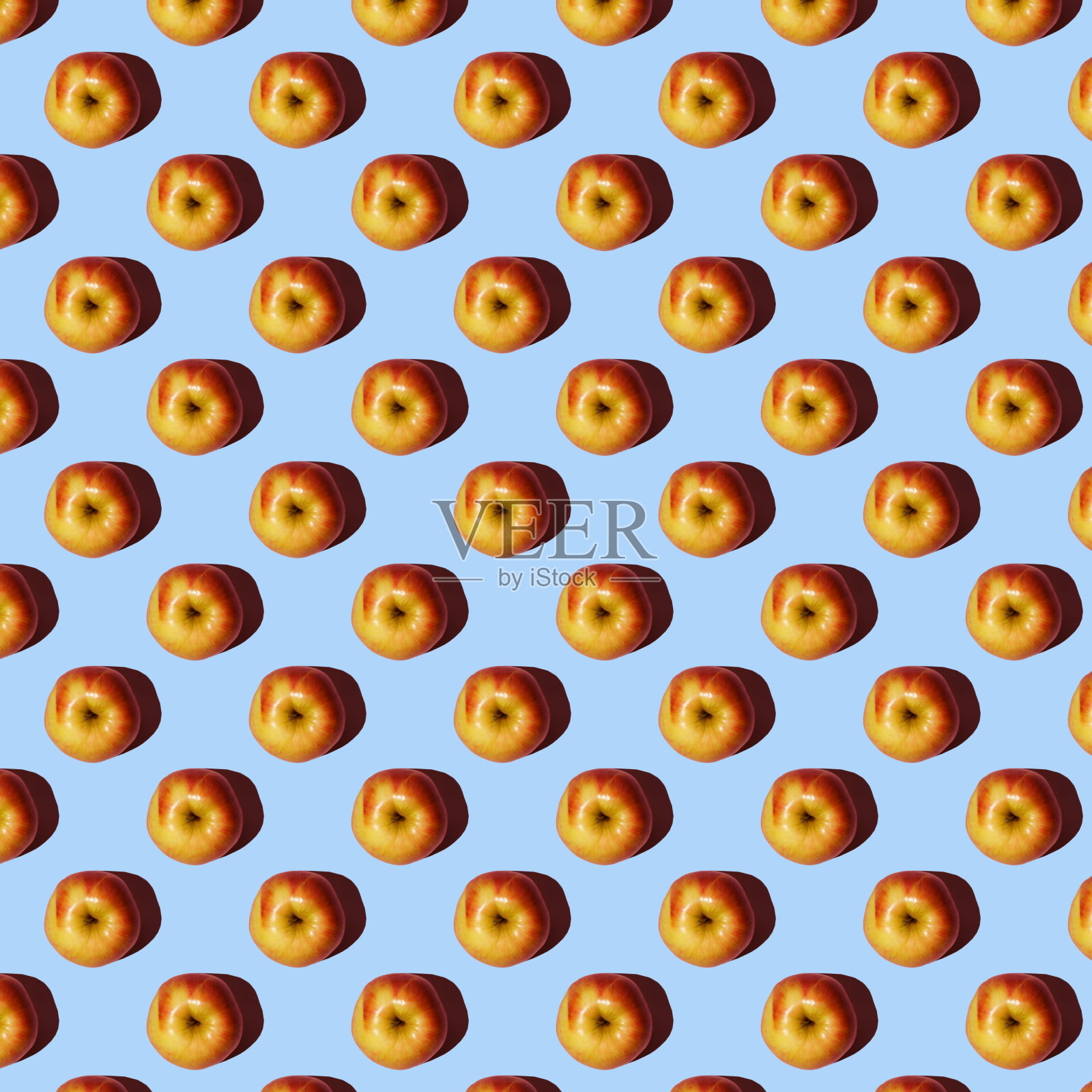 水果图案从新鲜的红苹果在一个蓝色的背景。查看无缝苹果图案照片摄影图片