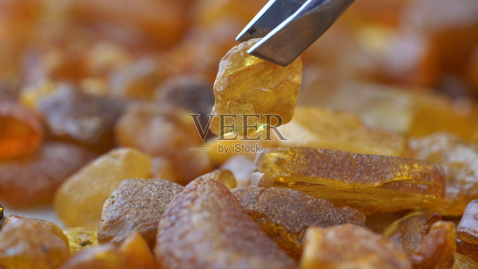 琥珀石收集微距特写照片摄影图片