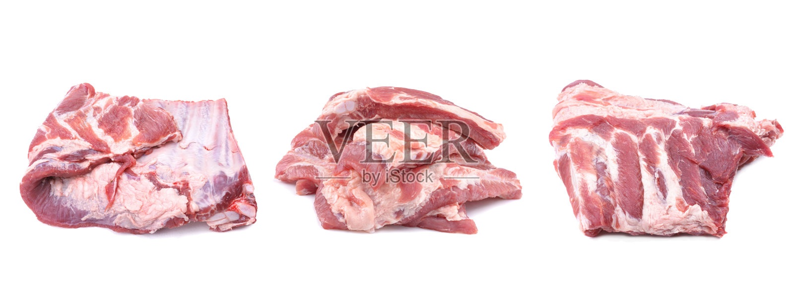 肉。生猪肉和牛排骨从不同的角度孤立在一个白色的背景。有选择性的重点。照片摄影图片