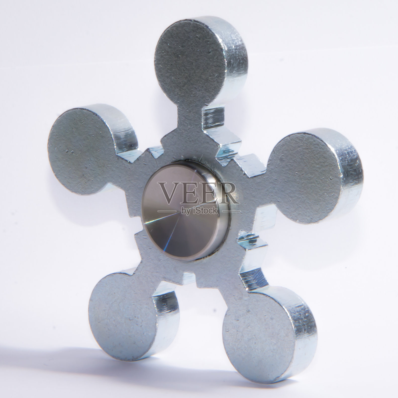 指尖陀螺用来放松,缓解压力,玩耍照片摄影图片