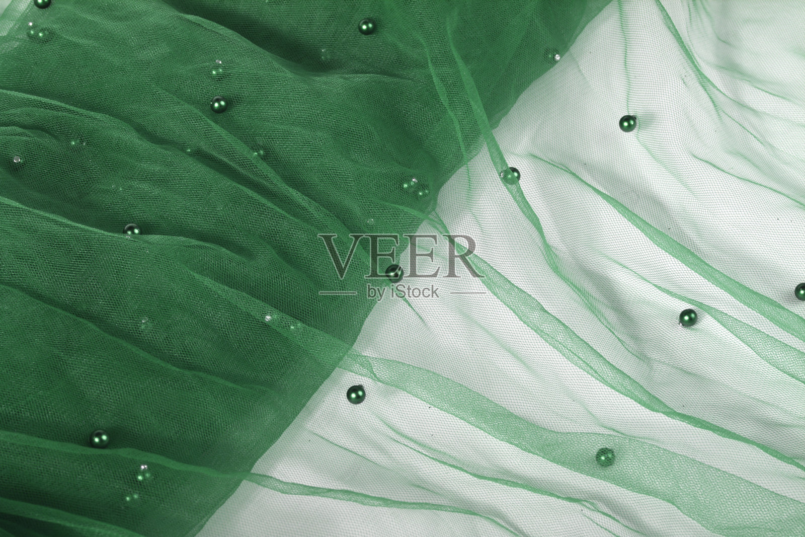 绿色皱巴巴的漂亮垂饰花边节日薄纱织物照片摄影图片