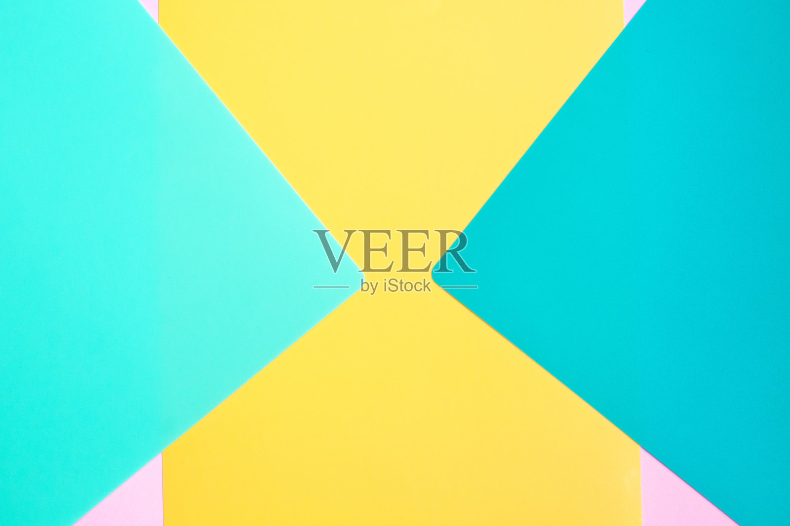 时尚抽象质感的粉色、黄色和蓝色纸张。照片摄影图片