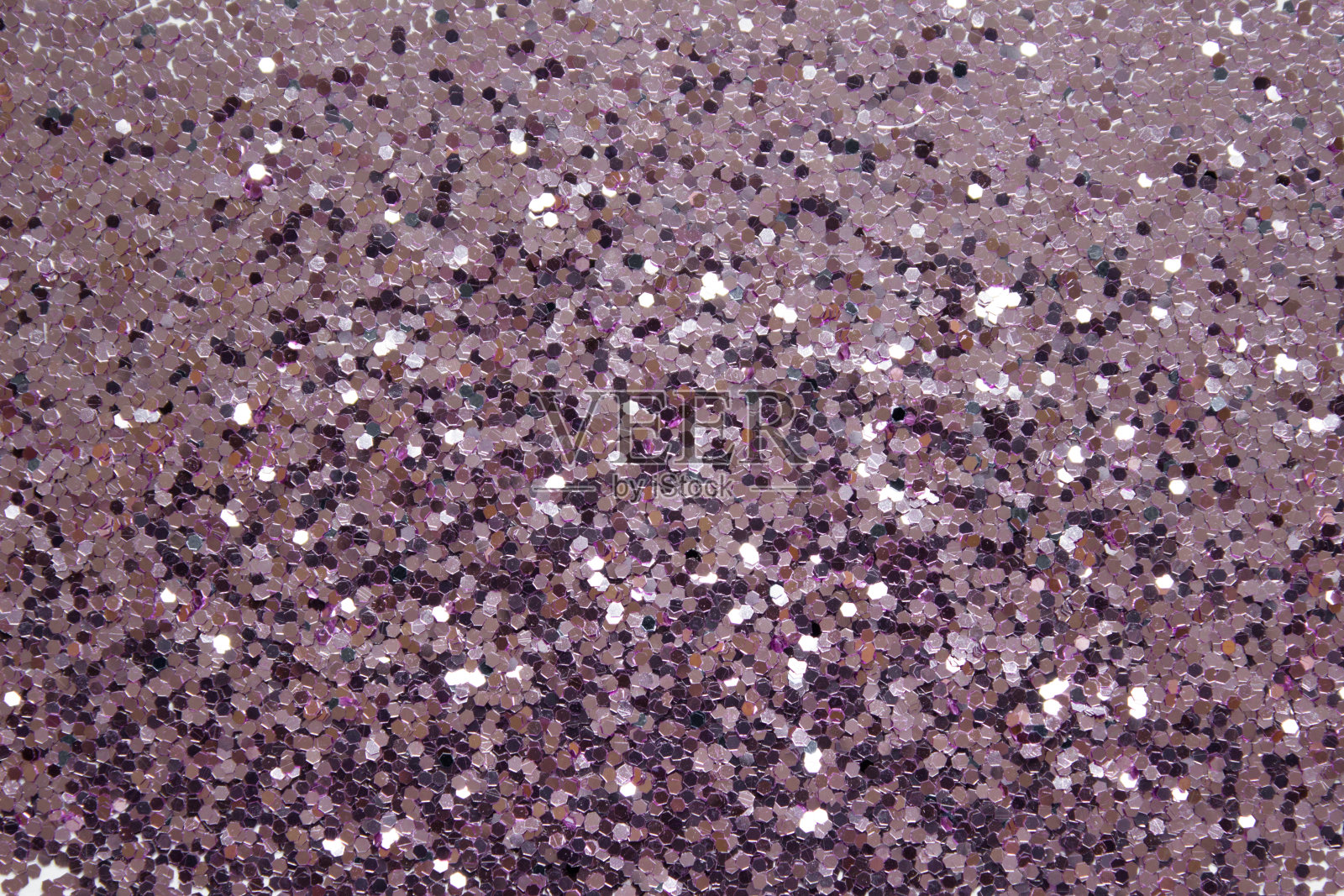 粉色闪光背景与许多小细节颗粒照片摄影图片