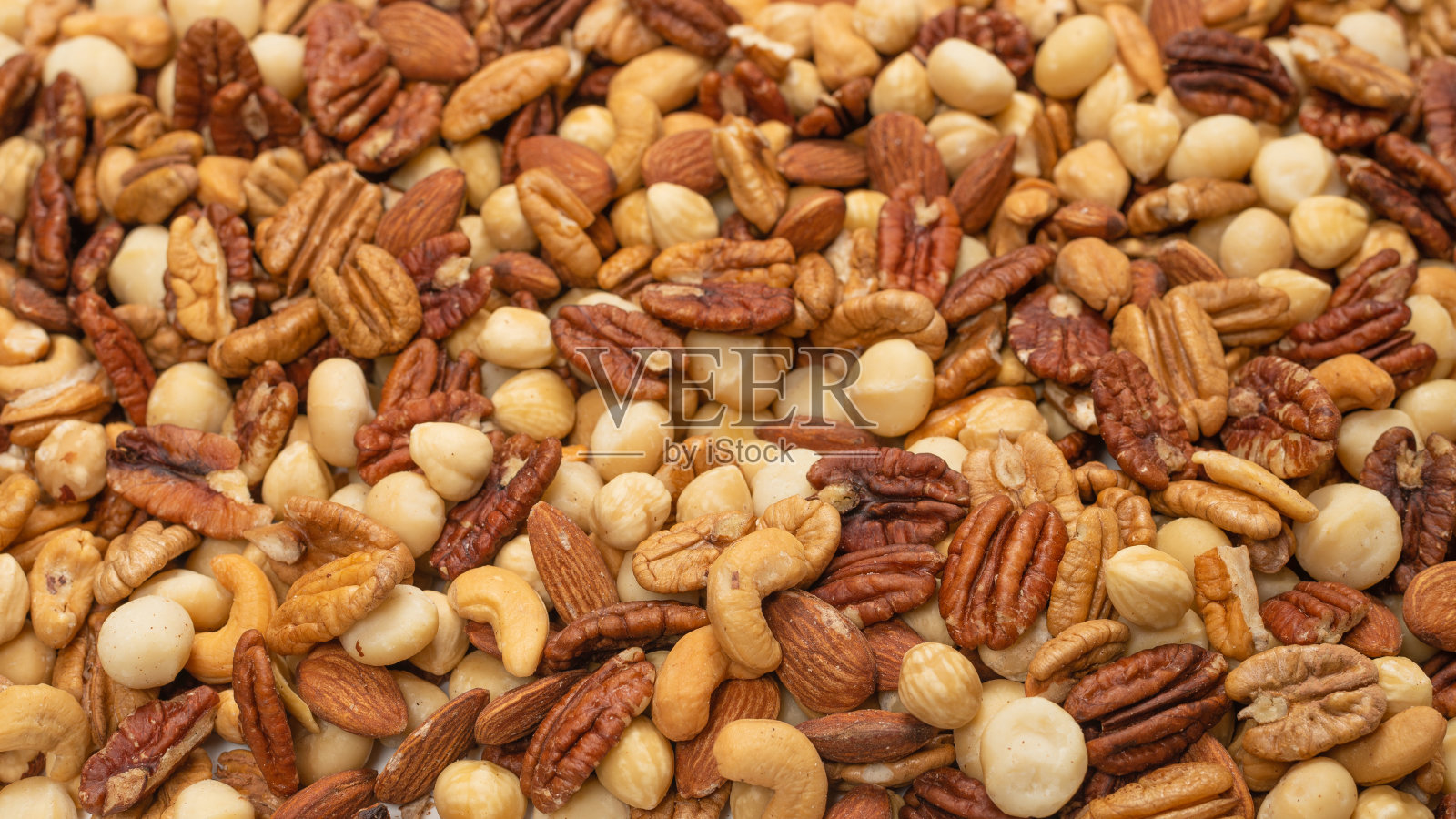 混合坚果作为背景。照片摄影图片