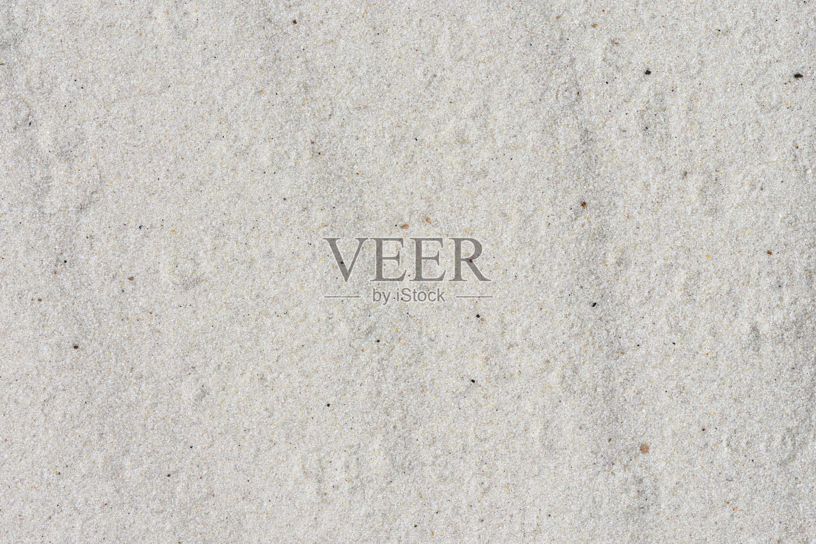 桑迪的背景。细沙纹理带雨滴。自然背景照片摄影图片