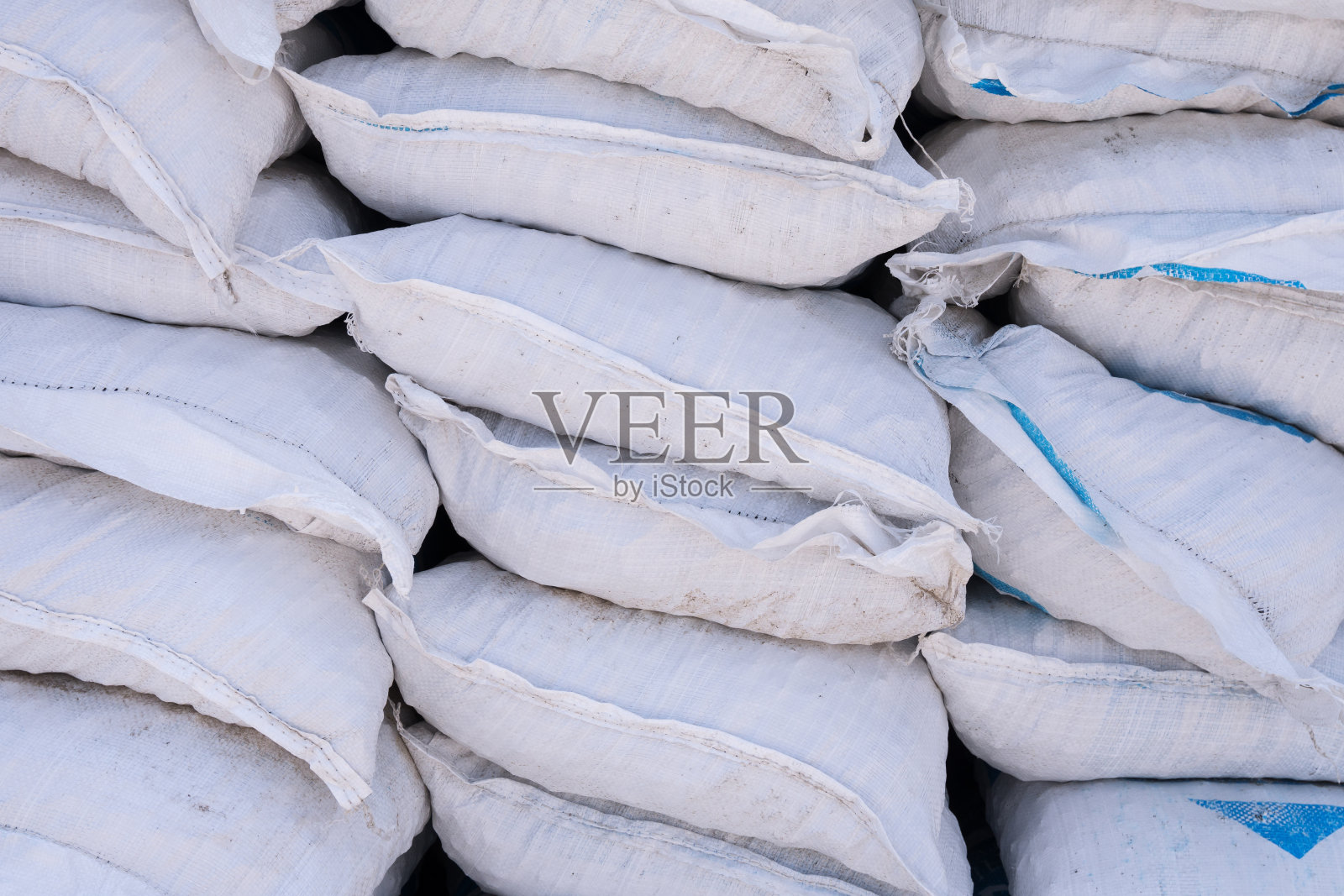 一堆堆水泥袋,特写照片摄影图片