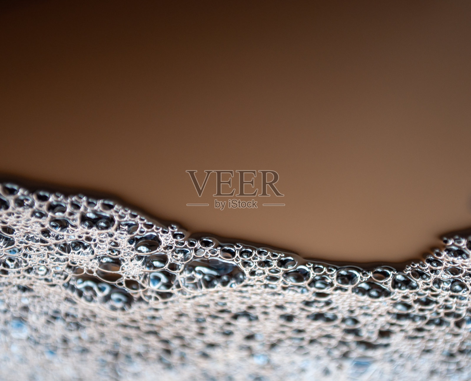 黑色的水滴。抽象的背景照片摄影图片