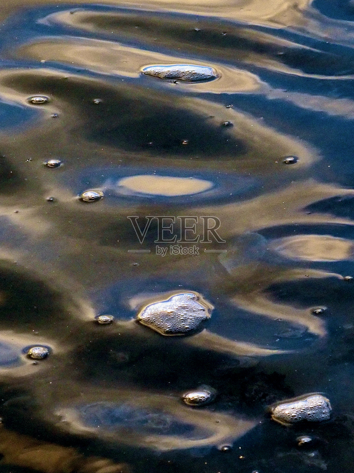 夕阳下的水波照片摄影图片