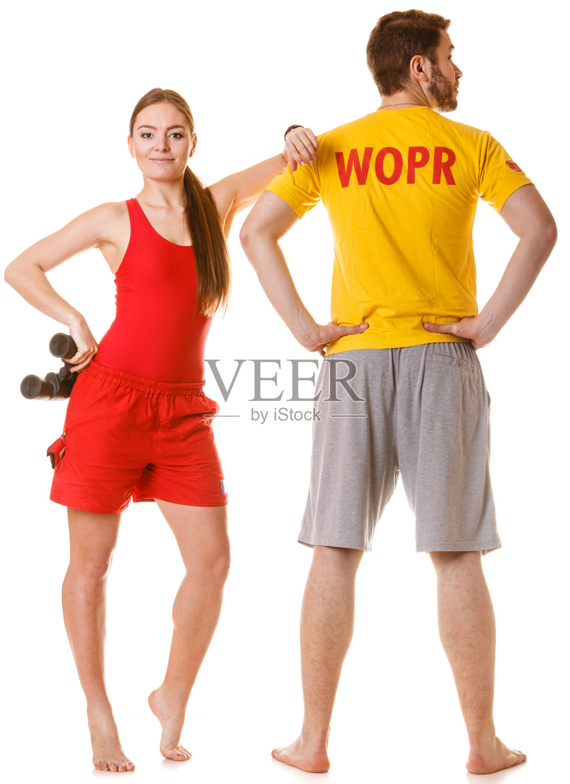 救生员用双筒望远镜。事故预防。照片摄影图片