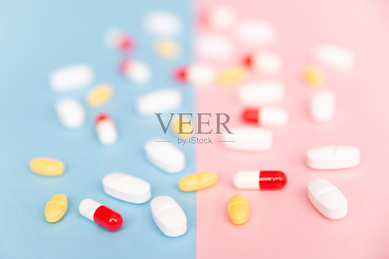 不同颜色的胶囊背景照片摄影图片