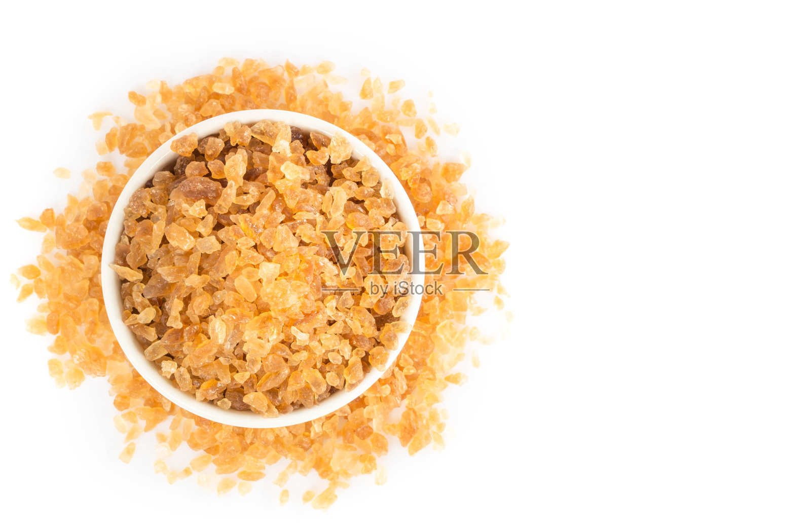 红糖在陶瓷碗孤立与白色背景,俯视图陶瓷碗在白色背景照片摄影图片