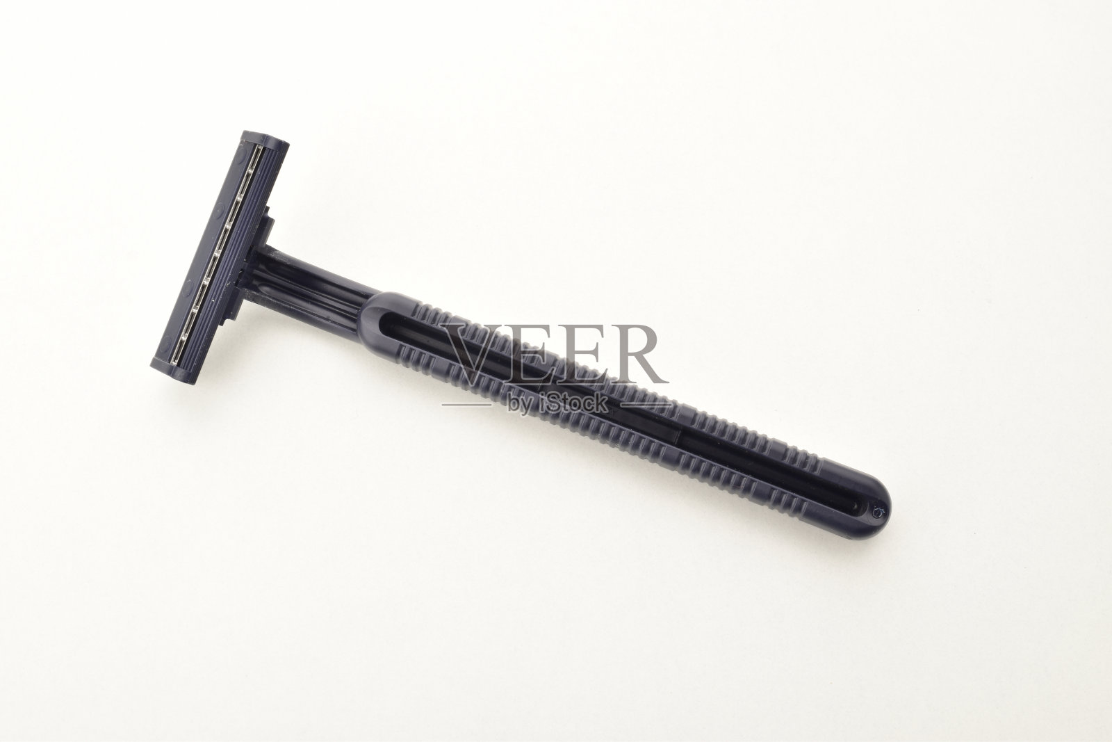 一次性剃须剃须刀在白色背景照片摄影图片