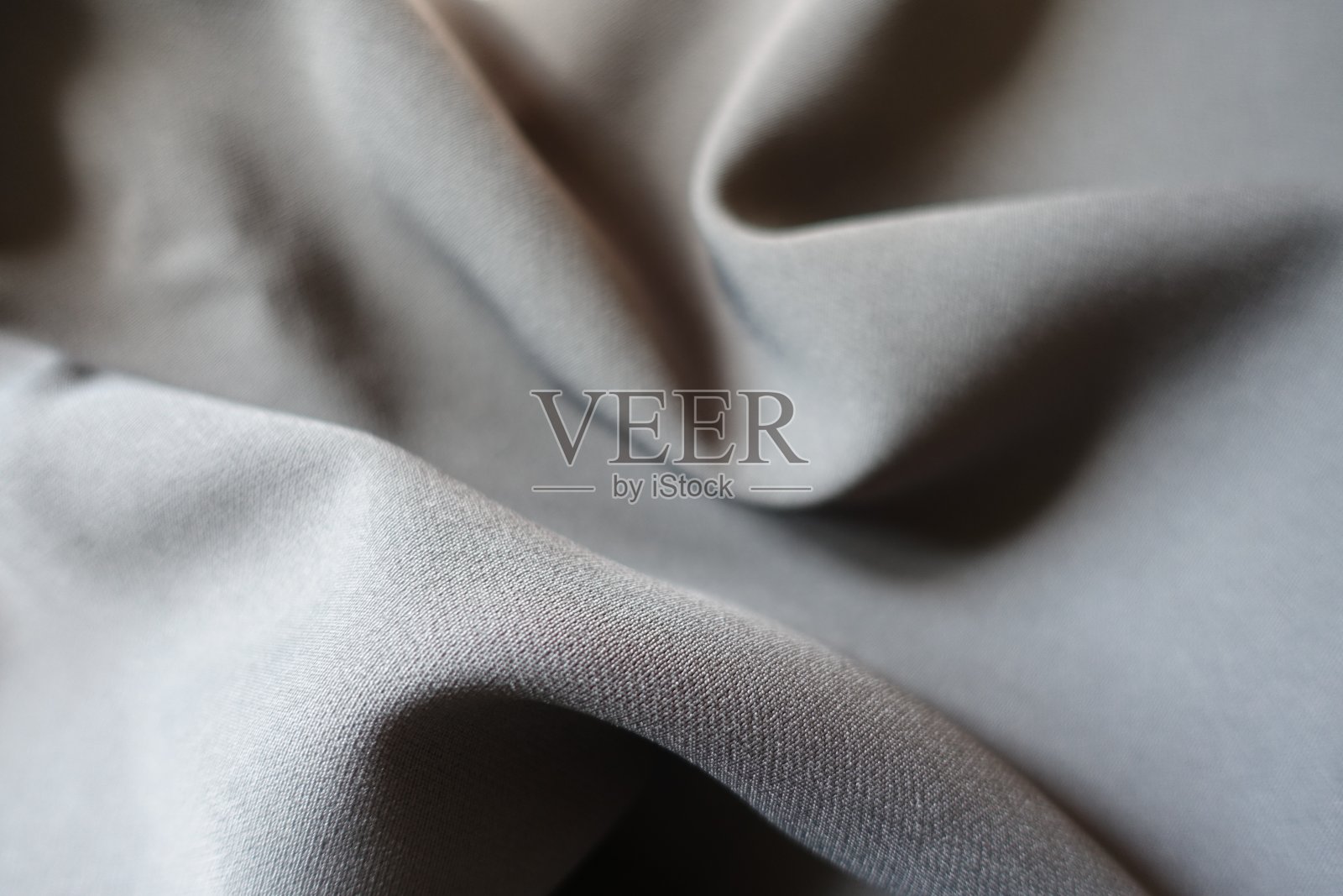 褶皱简单的深灰色粘胶和聚酯织物照片摄影图片