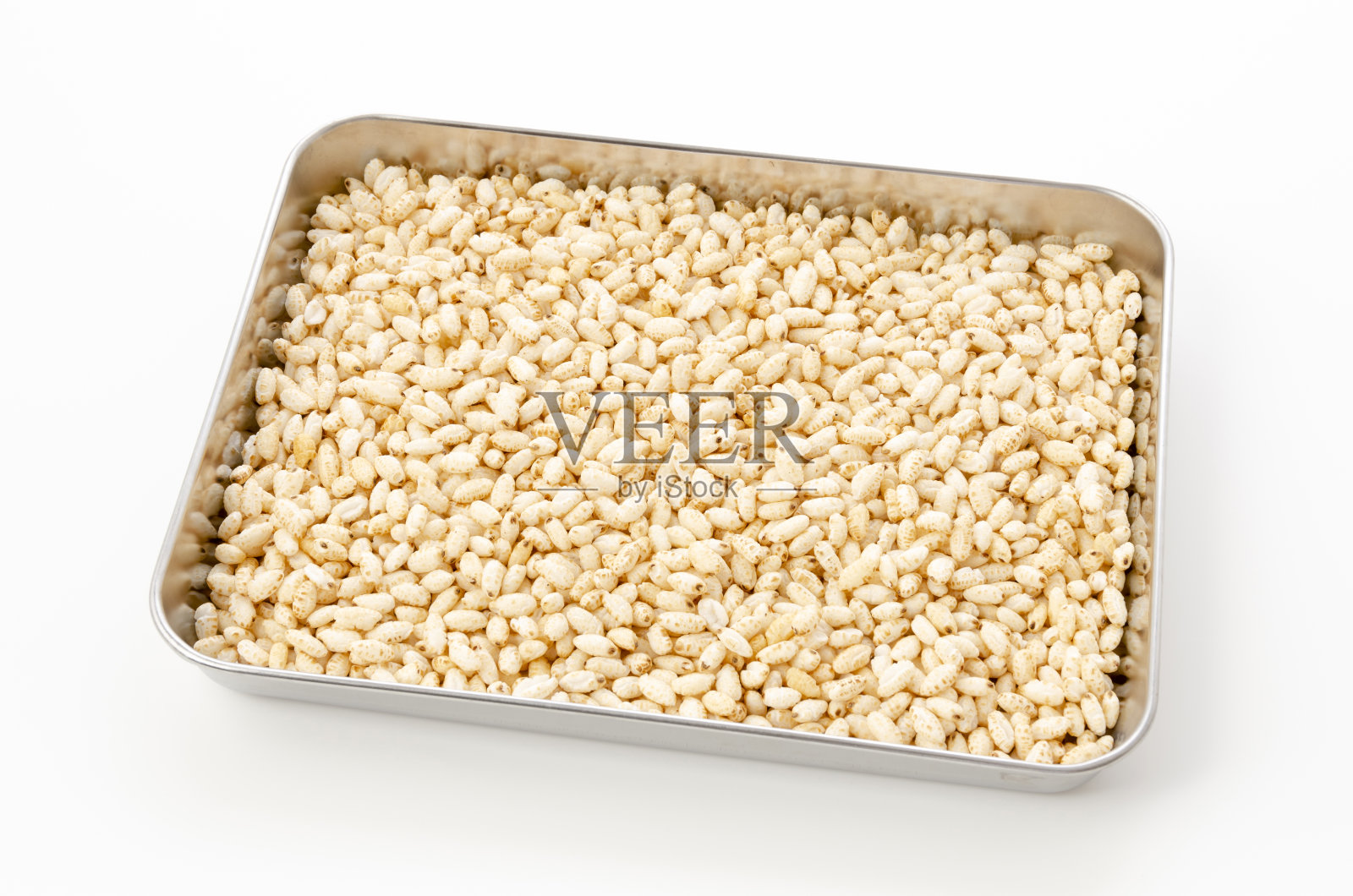 白色背景的铝盘里的糯米照片摄影图片