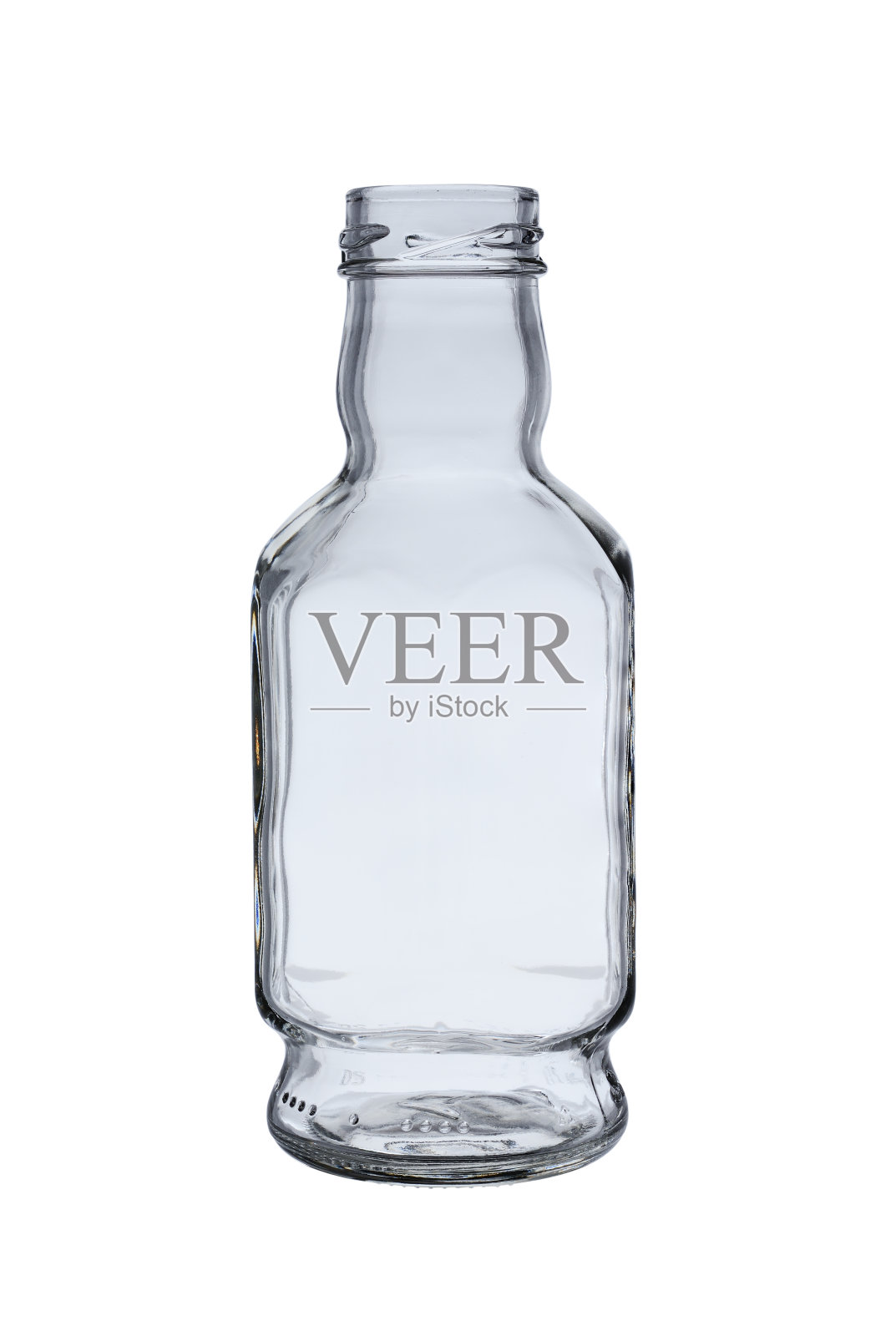 用来装调味汁和果汁的空的、打开的透明玻璃瓶。被孤立在白色背景下,特写镜头照片摄影图片