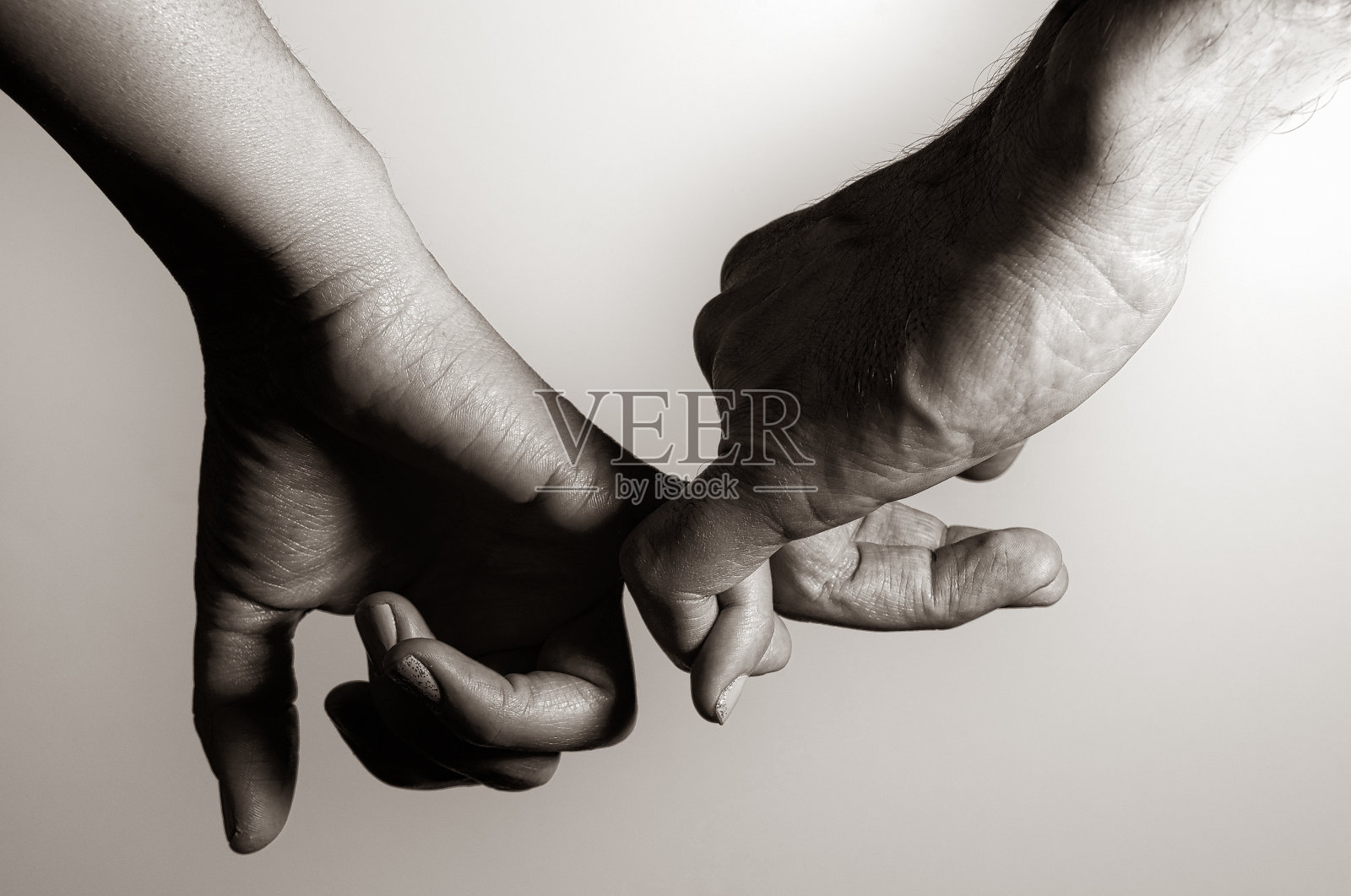 2手交织在一起照片摄影图片