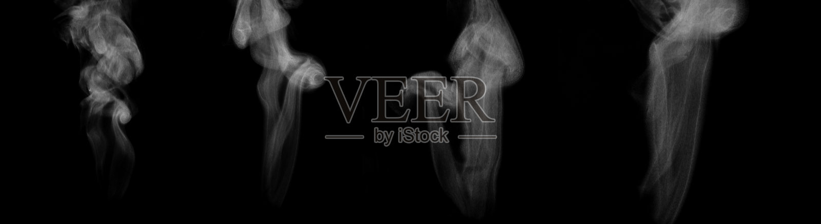 一组稀薄的蒸汽流隔离在黑色背景照片摄影图片