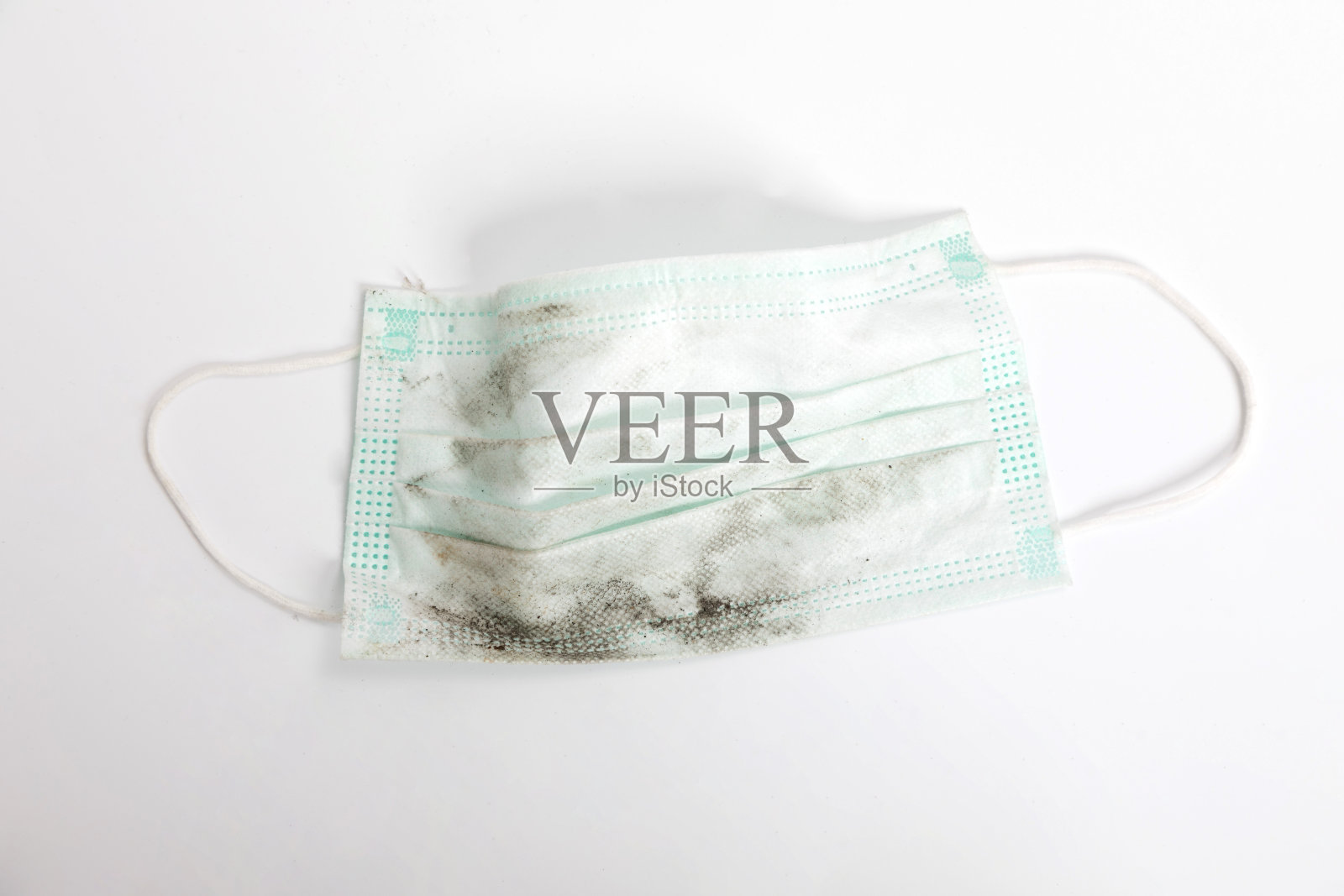 使用过及不洁的外科口罩照片摄影图片