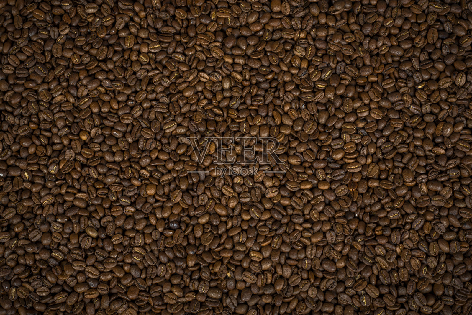 以咖啡豆为背景照片摄影图片