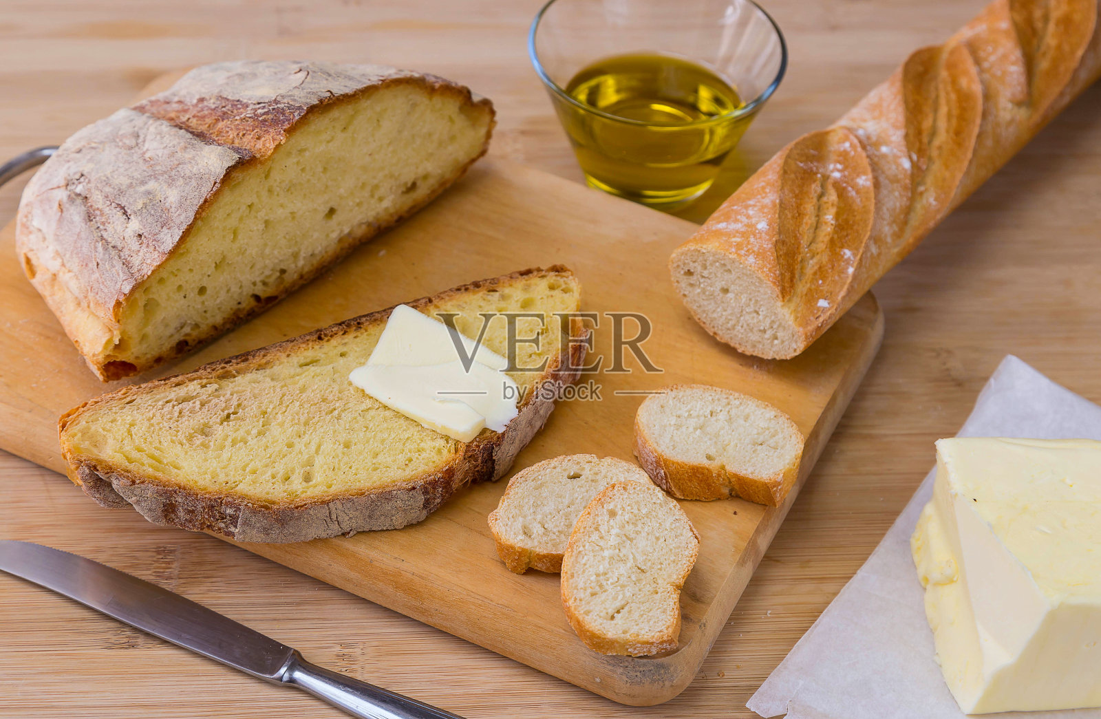 抹着黄油的面包片照片摄影图片