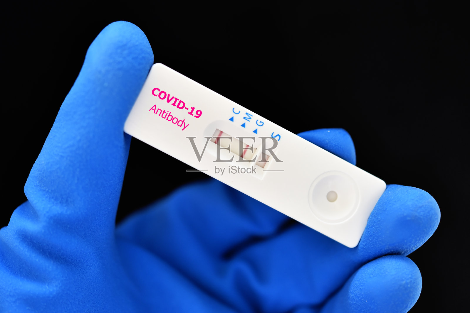 COVID-19 IgG抗体快速检测阳性照片摄影图片