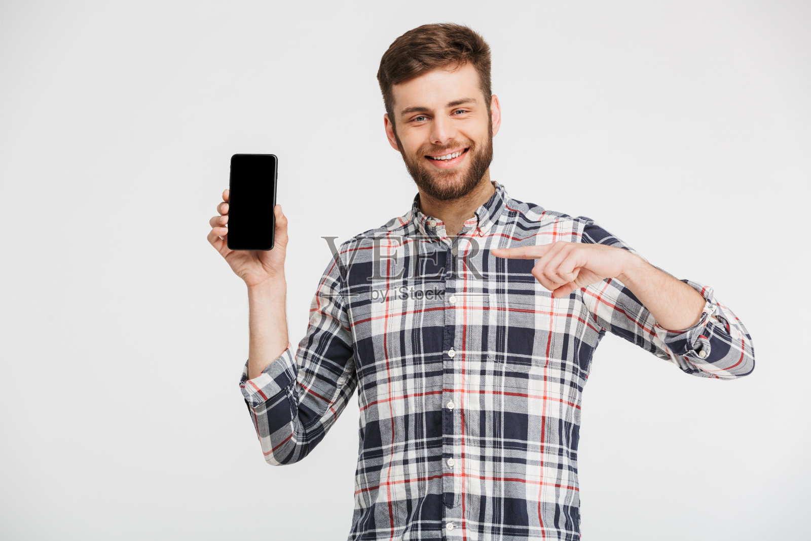 一个自信的年轻人在指指点点照片摄影图片