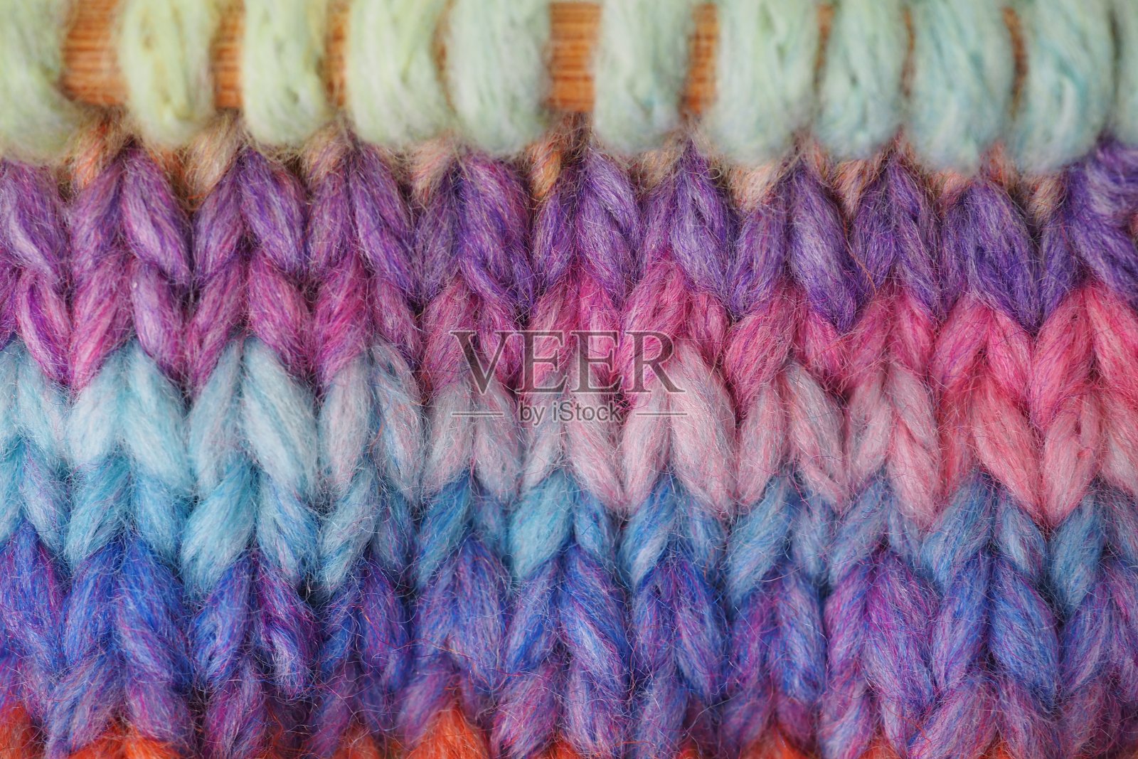 手工编织的背景在蓝色和粉红色照片摄影图片