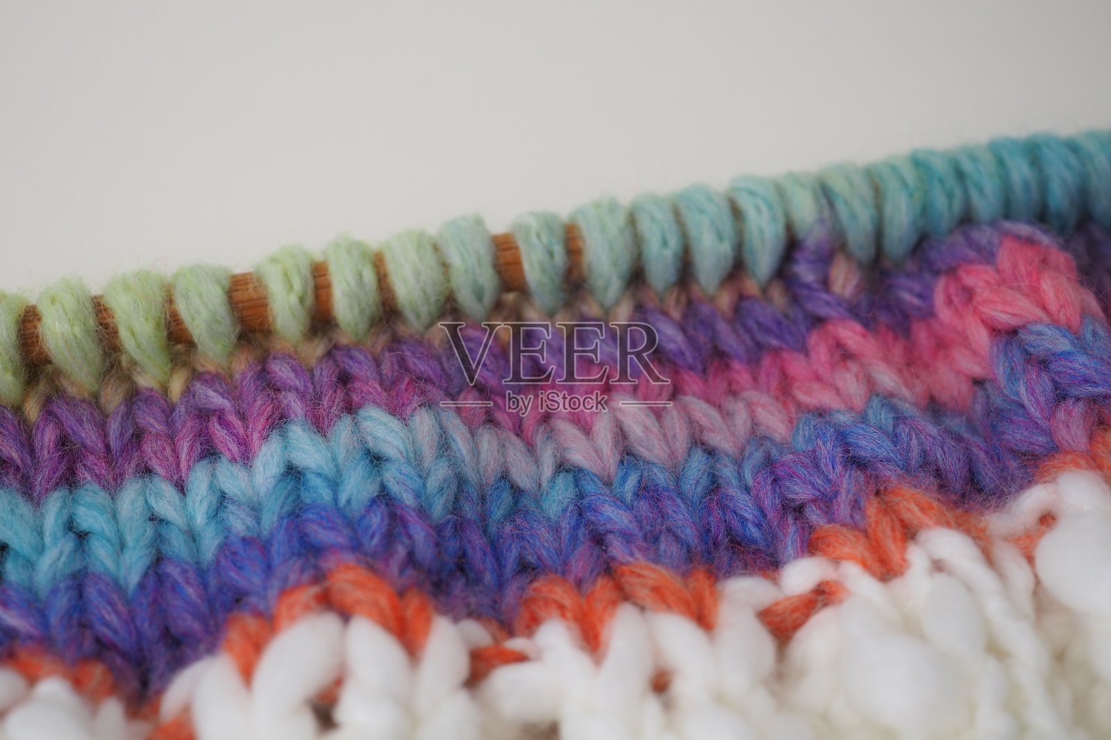 手工编织的背景在蓝色和粉红色照片摄影图片