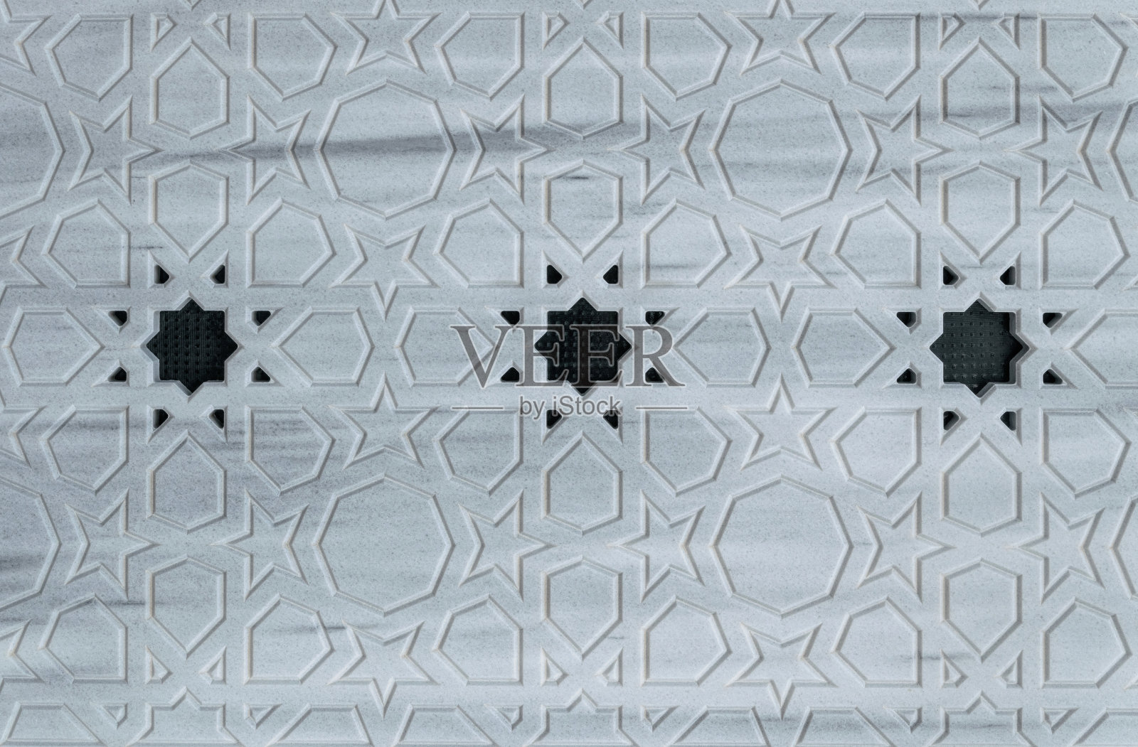 东方风格的雕刻花卉图案的石材大理石墙照片摄影图片