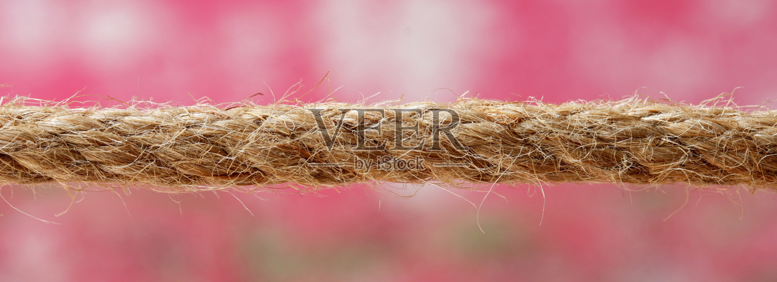 在彩色背景上有连接的绳子照片摄影图片