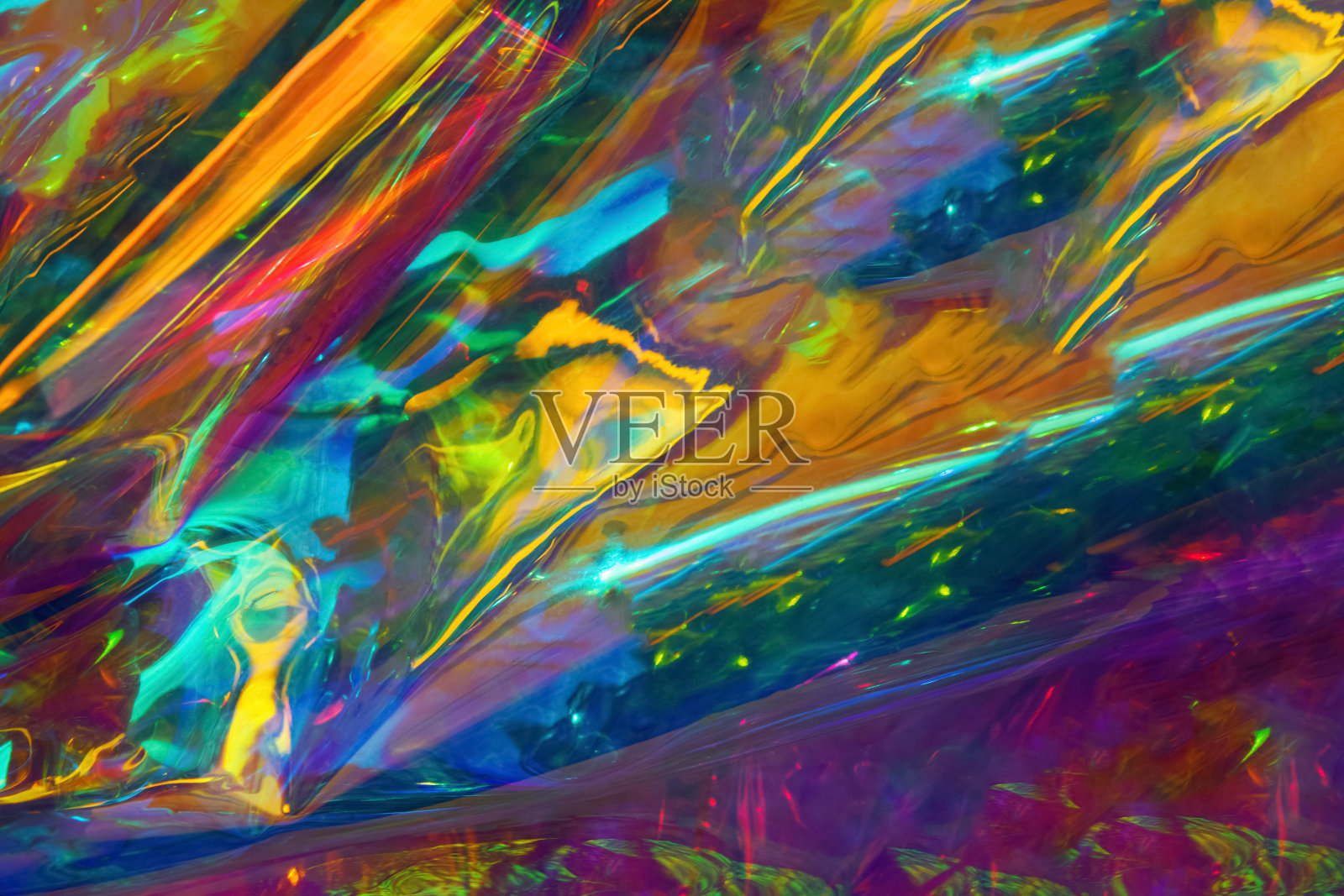 抽象的彩虹背景,节日全息彩带的壁纸图像,很好的设计主意。照片摄影图片