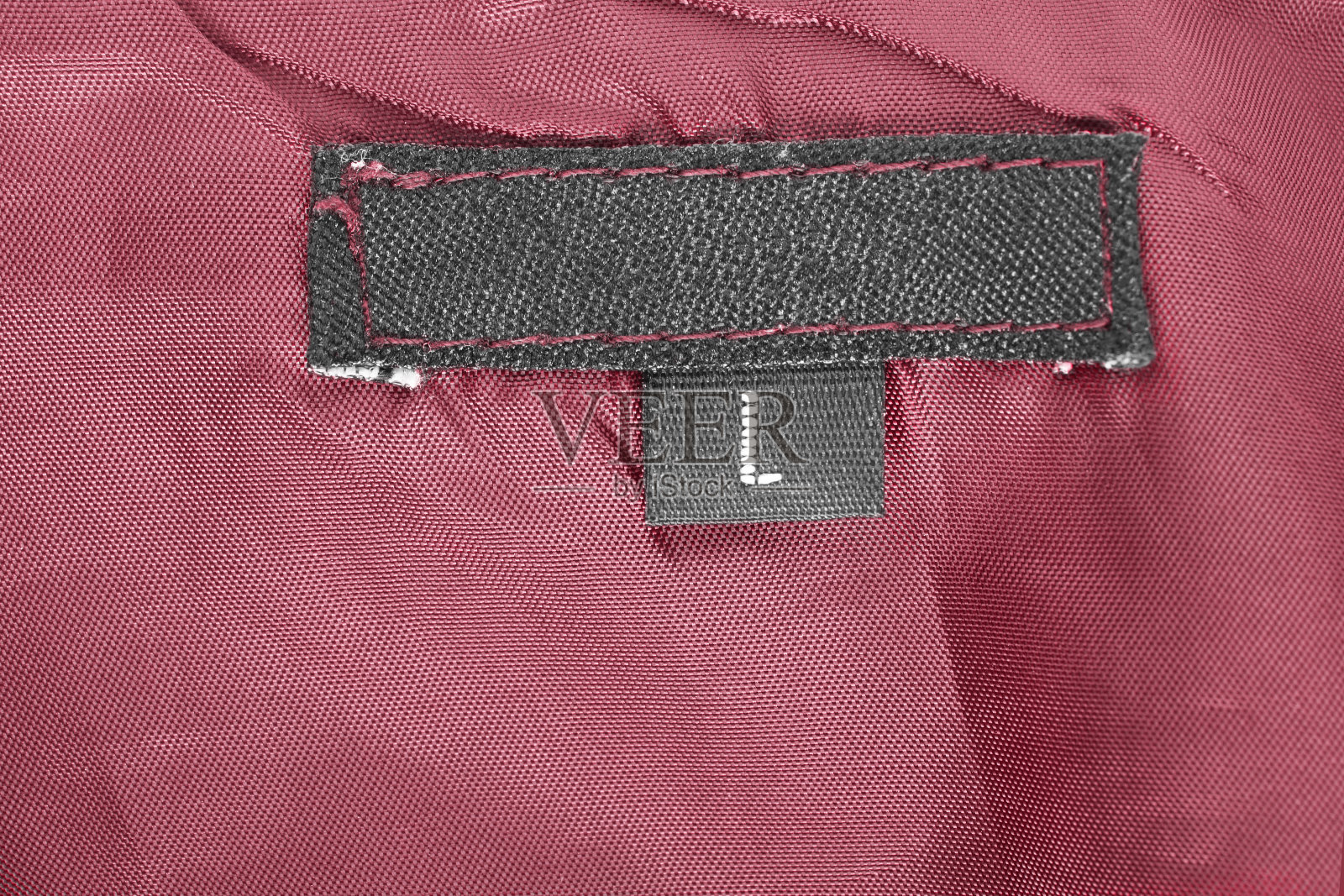 L码服装标签照片摄影图片