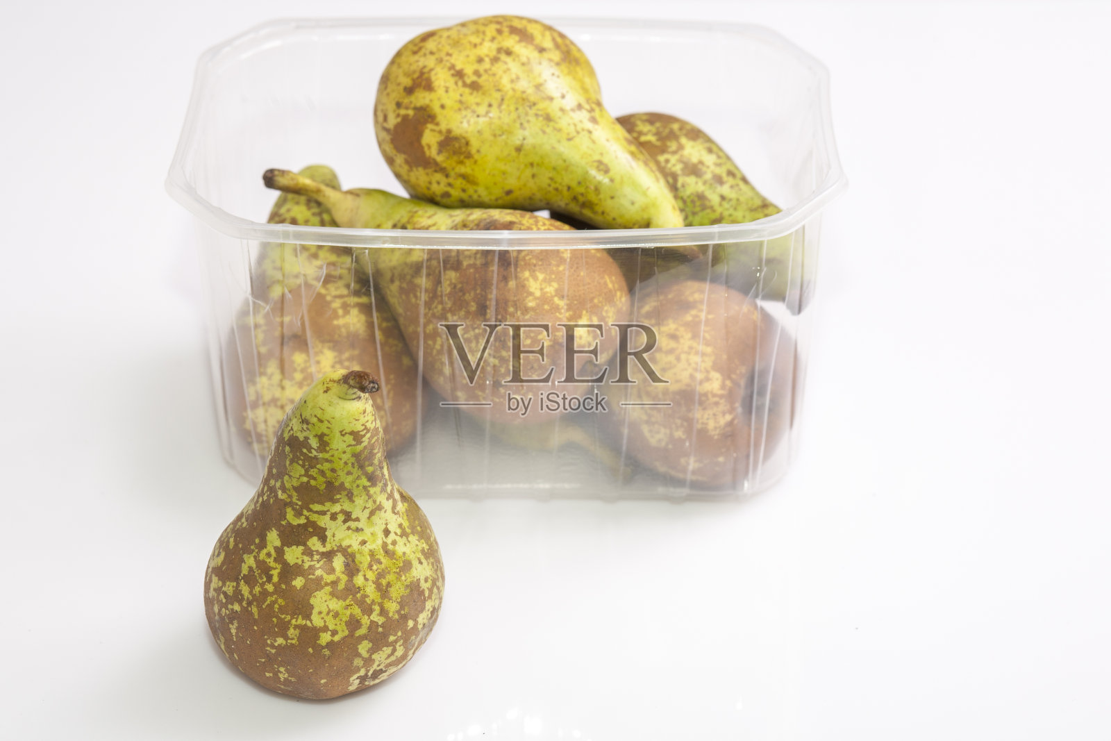 会议梨的塑料包装上照片摄影图片