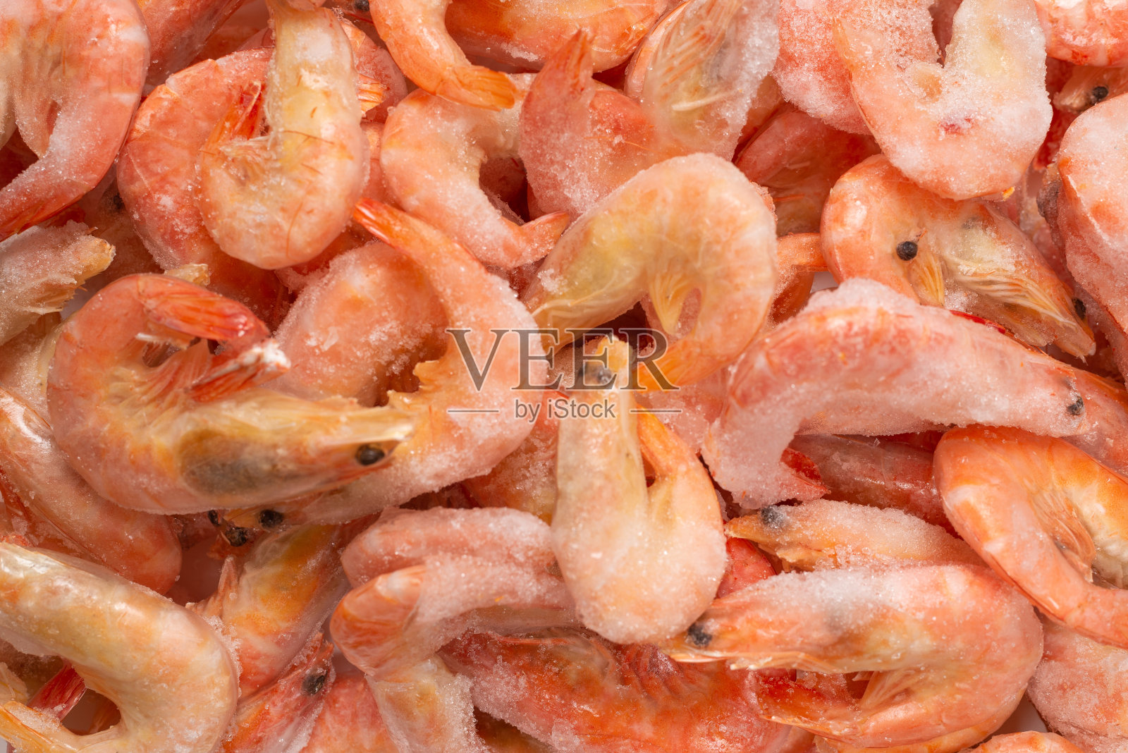 冰镇鲜虾。前视图。照片摄影图片