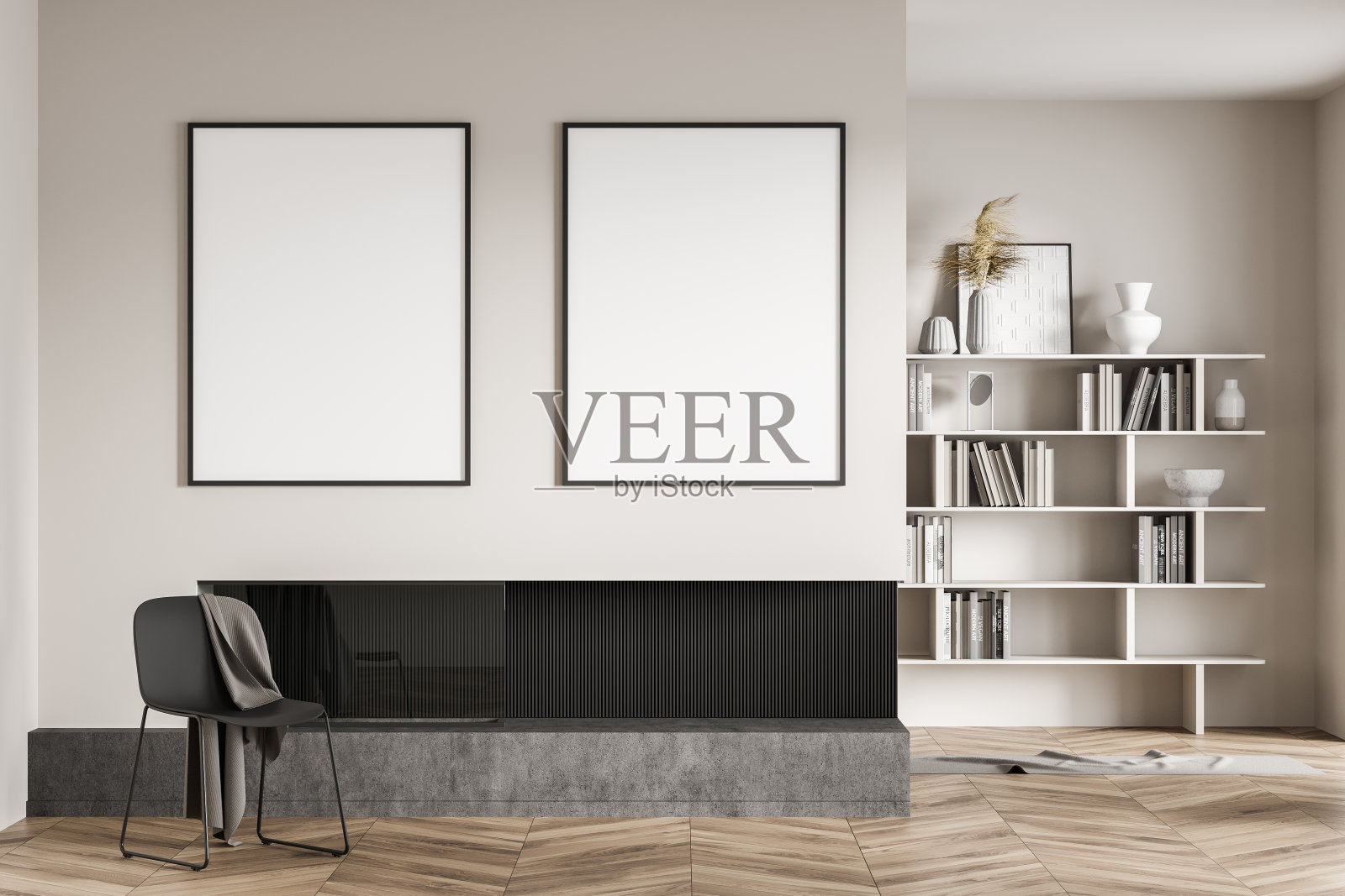 用书架和家具照亮客厅内部,墙上贴着海报照片摄影图片