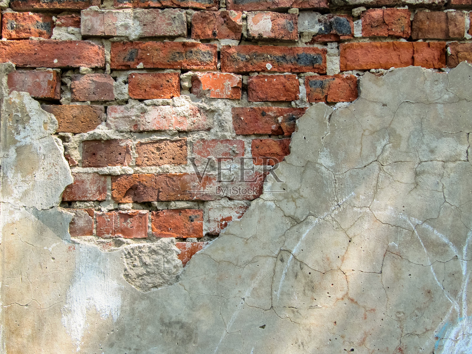 红砖和剥皮的灰泥墙照片摄影图片