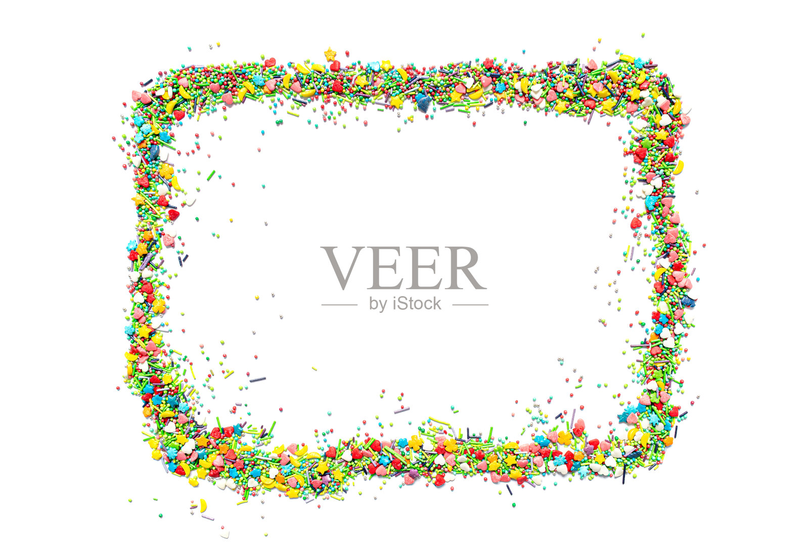 明亮的孤立框架,由多色的甜洒不同形状的心,星星,月亮,花,圆球和棒子照片摄影图片