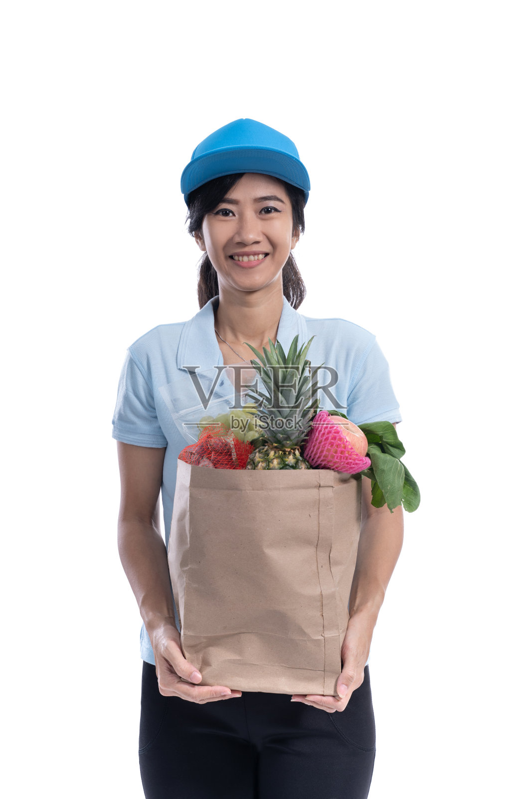 快递员带杂货照片摄影图片