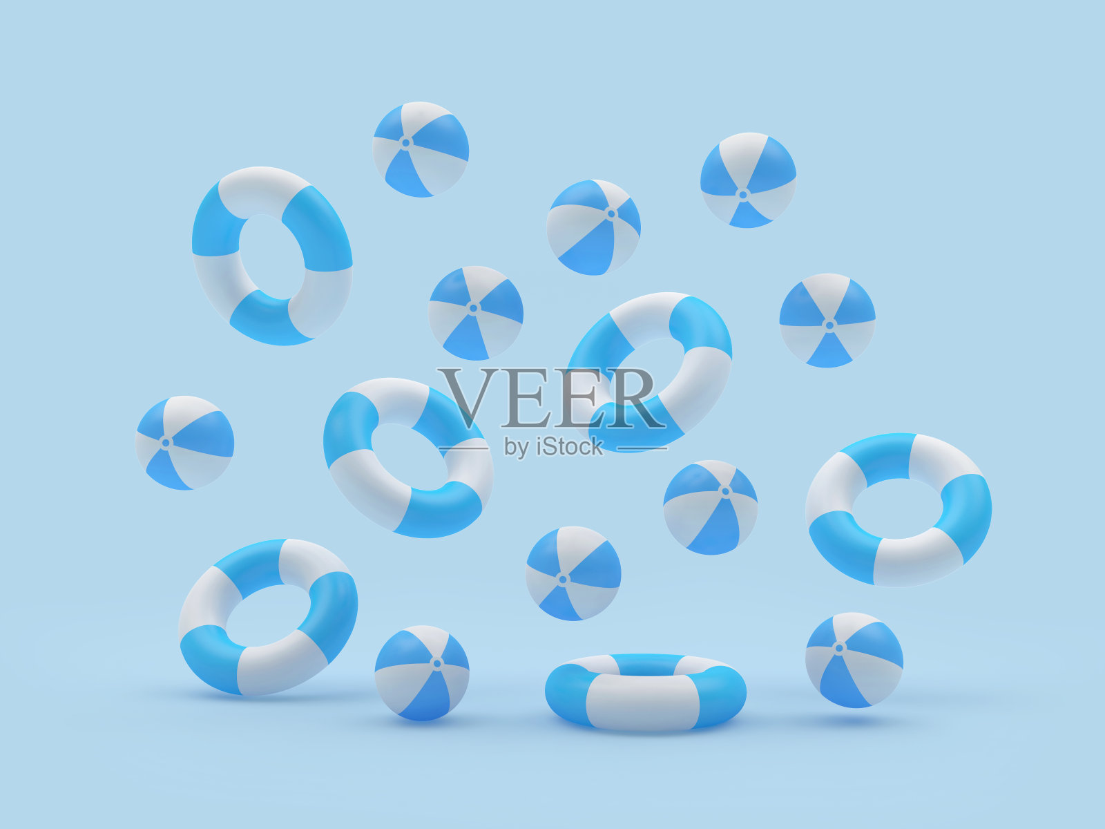 许多救生圈和沙滩球落在蓝色照片摄影图片