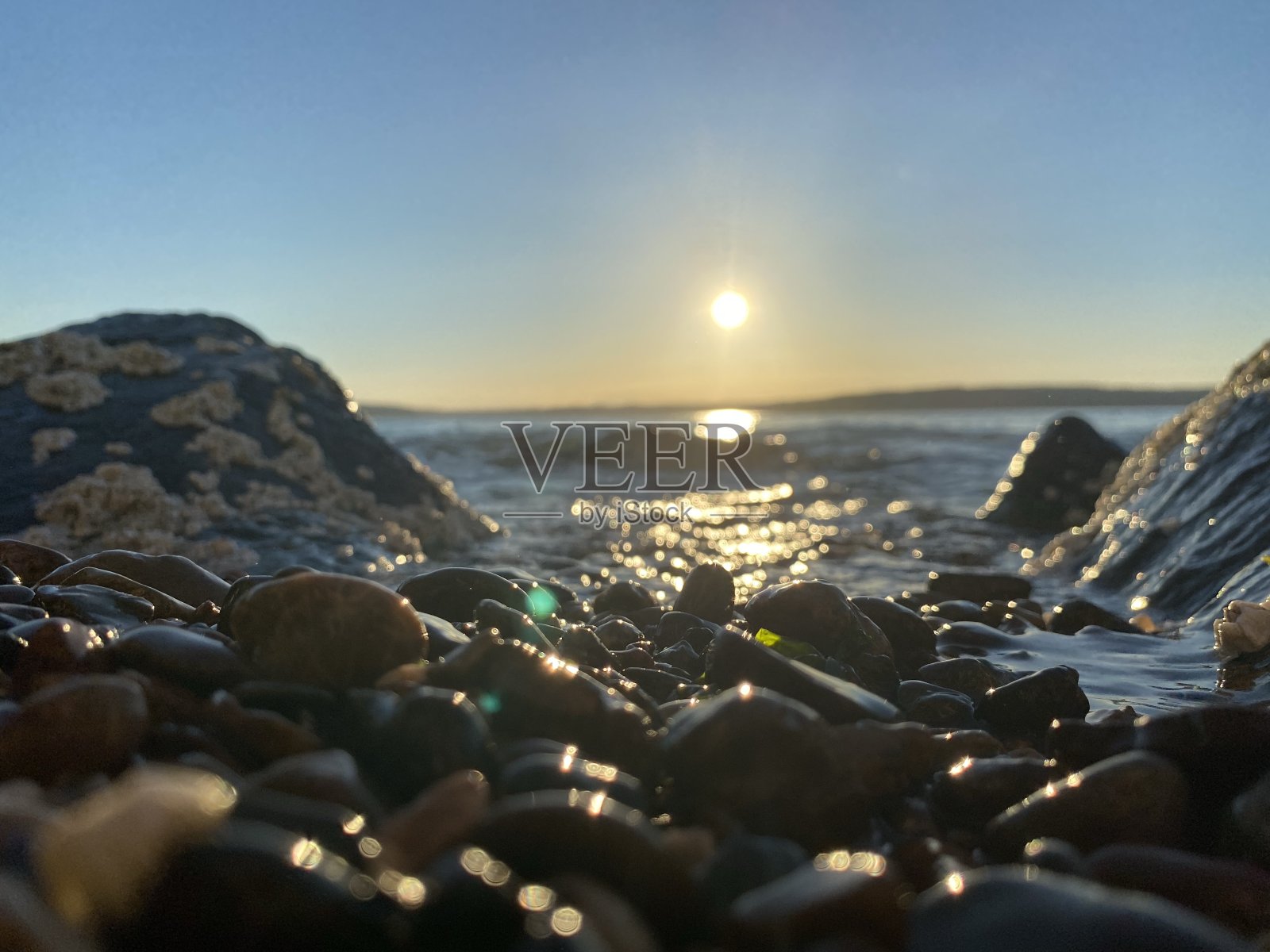 岩石海滩日落照片摄影图片