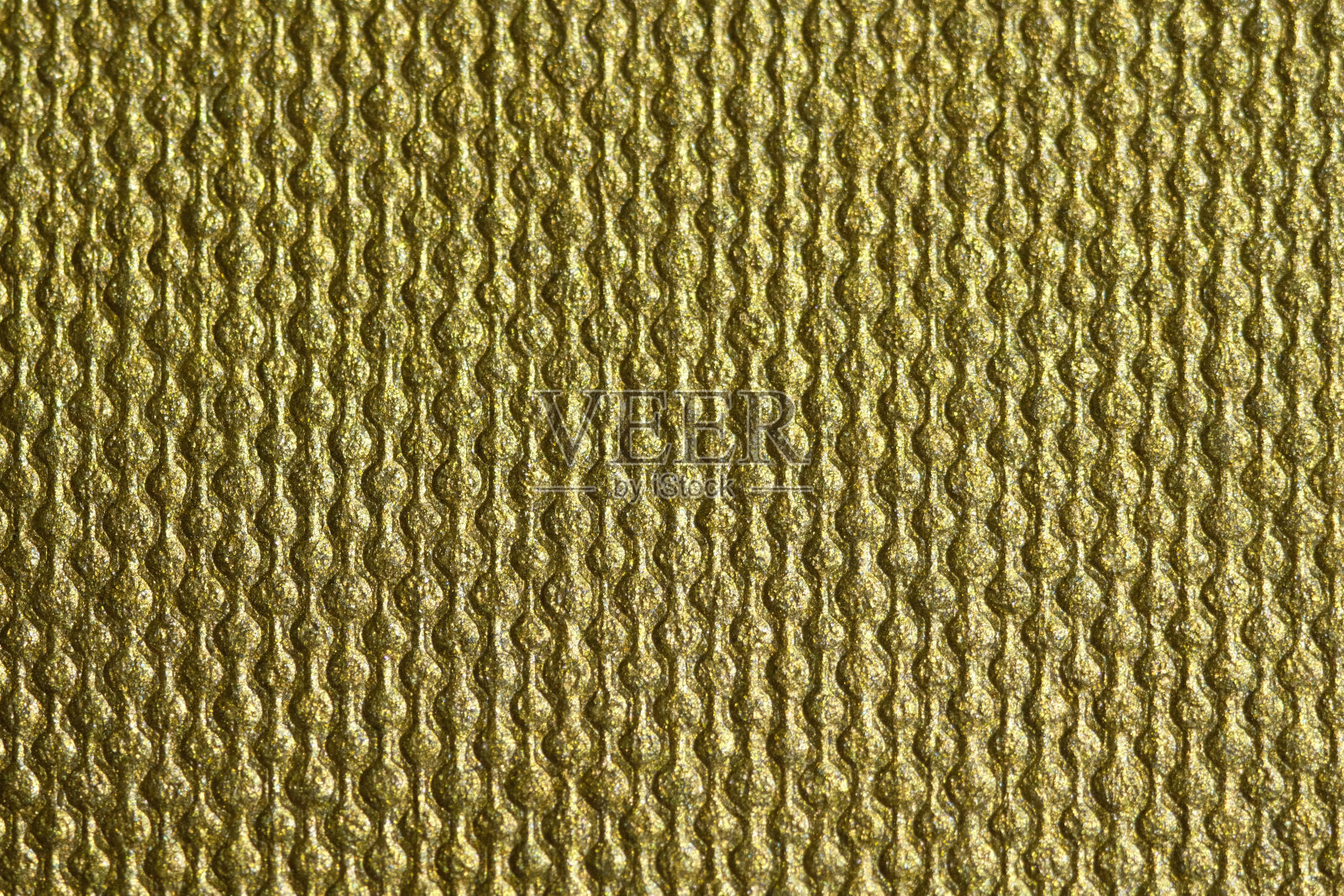 金色,纸张表面纹理背景的金色。照片摄影图片