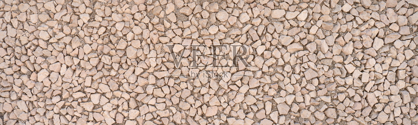 全景特写的暴露骨料混凝土制成的小角的石头照片摄影图片