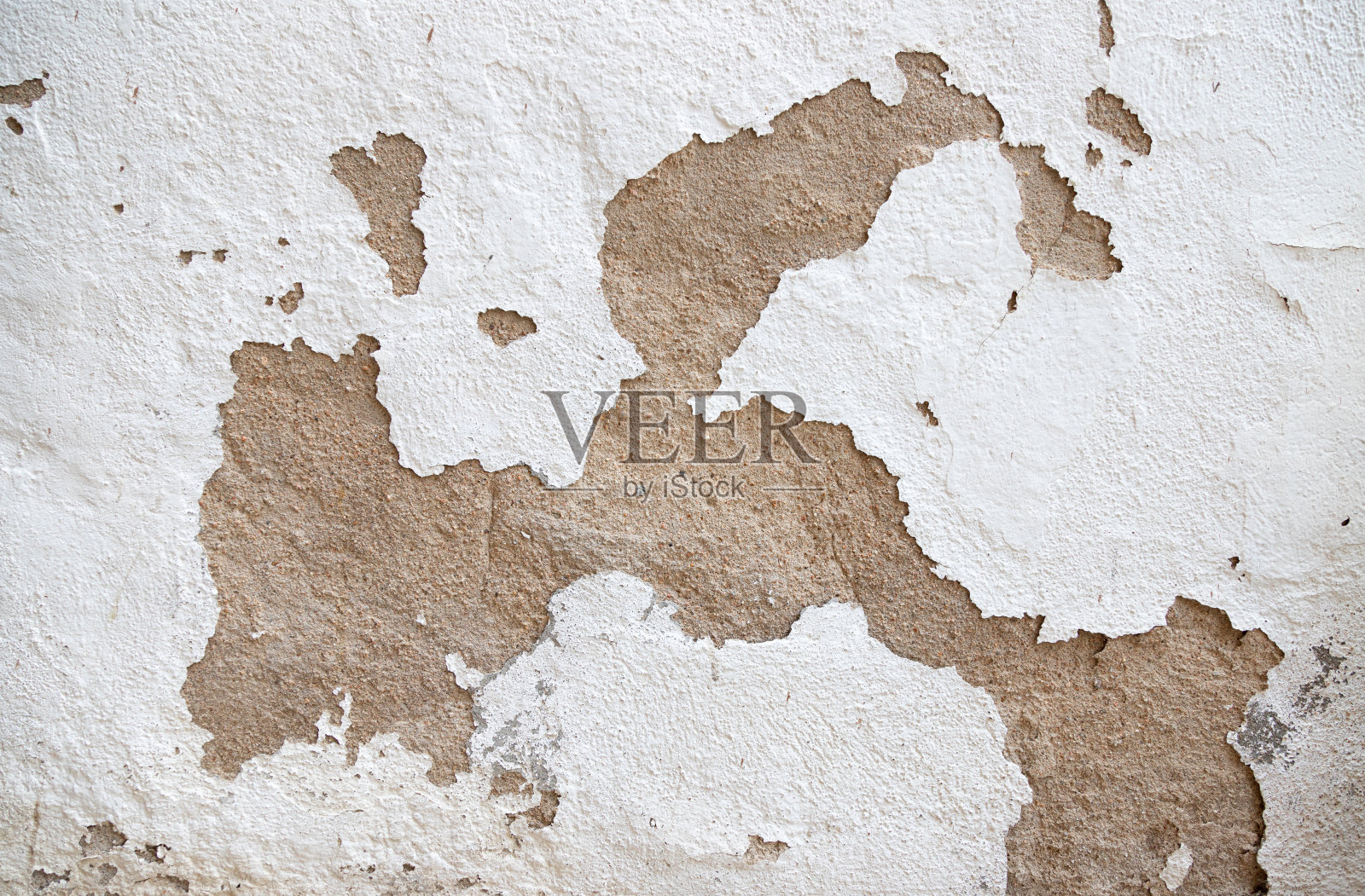 破碎的白墙。照片摄影图片