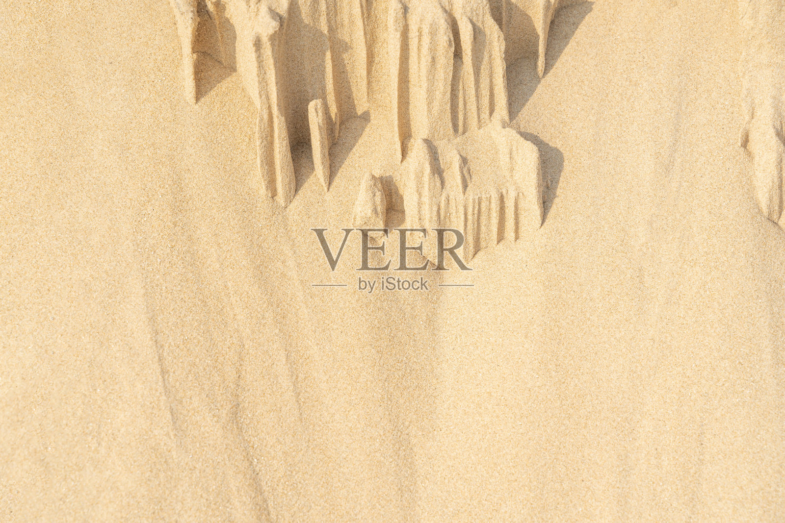 彩砂的背景。照片摄影图片