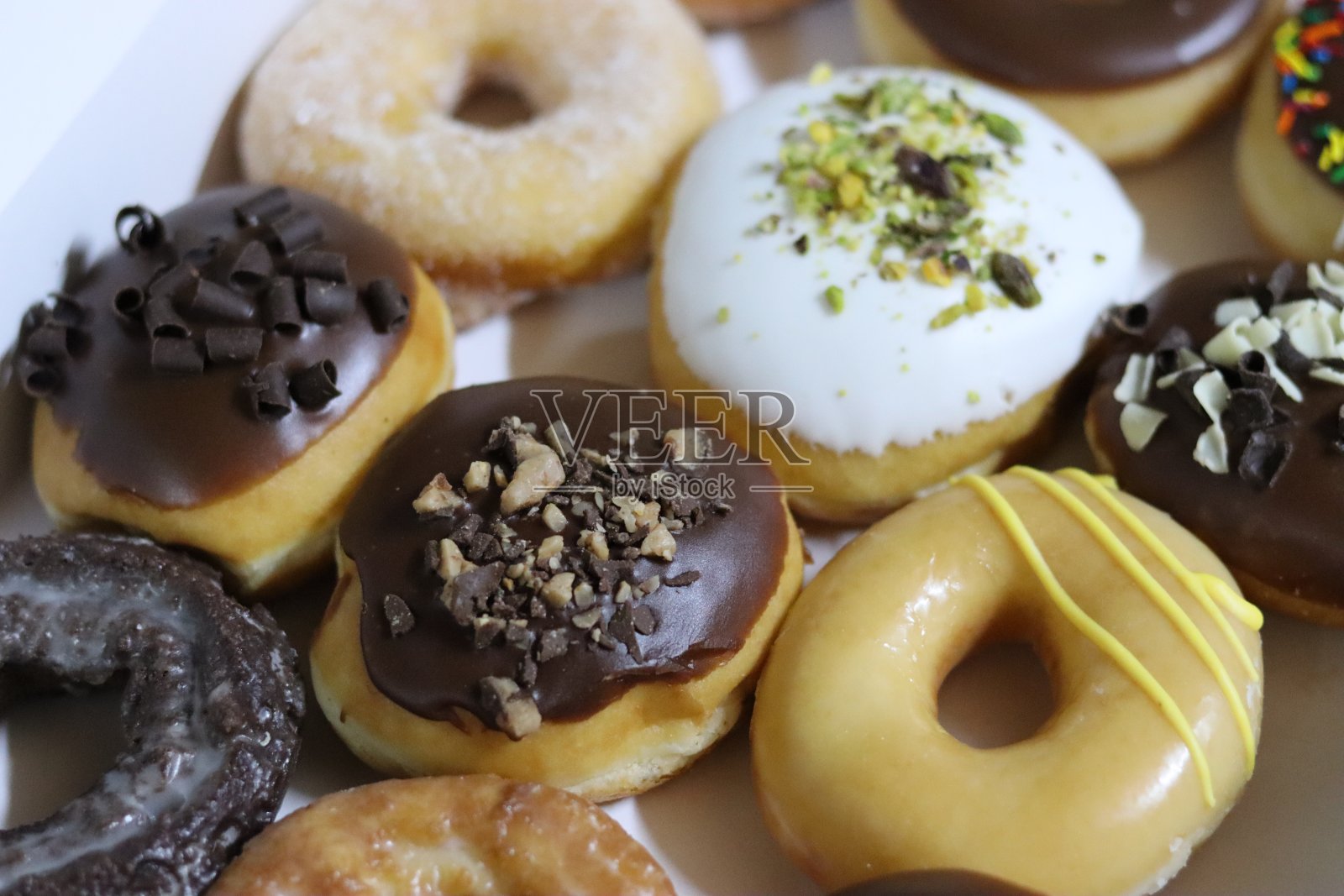 多种口味的甜甜圈照片摄影图片