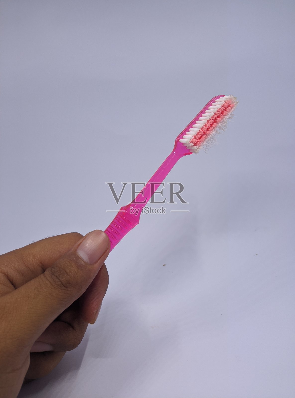 用过的粉红色牙刷照片摄影图片