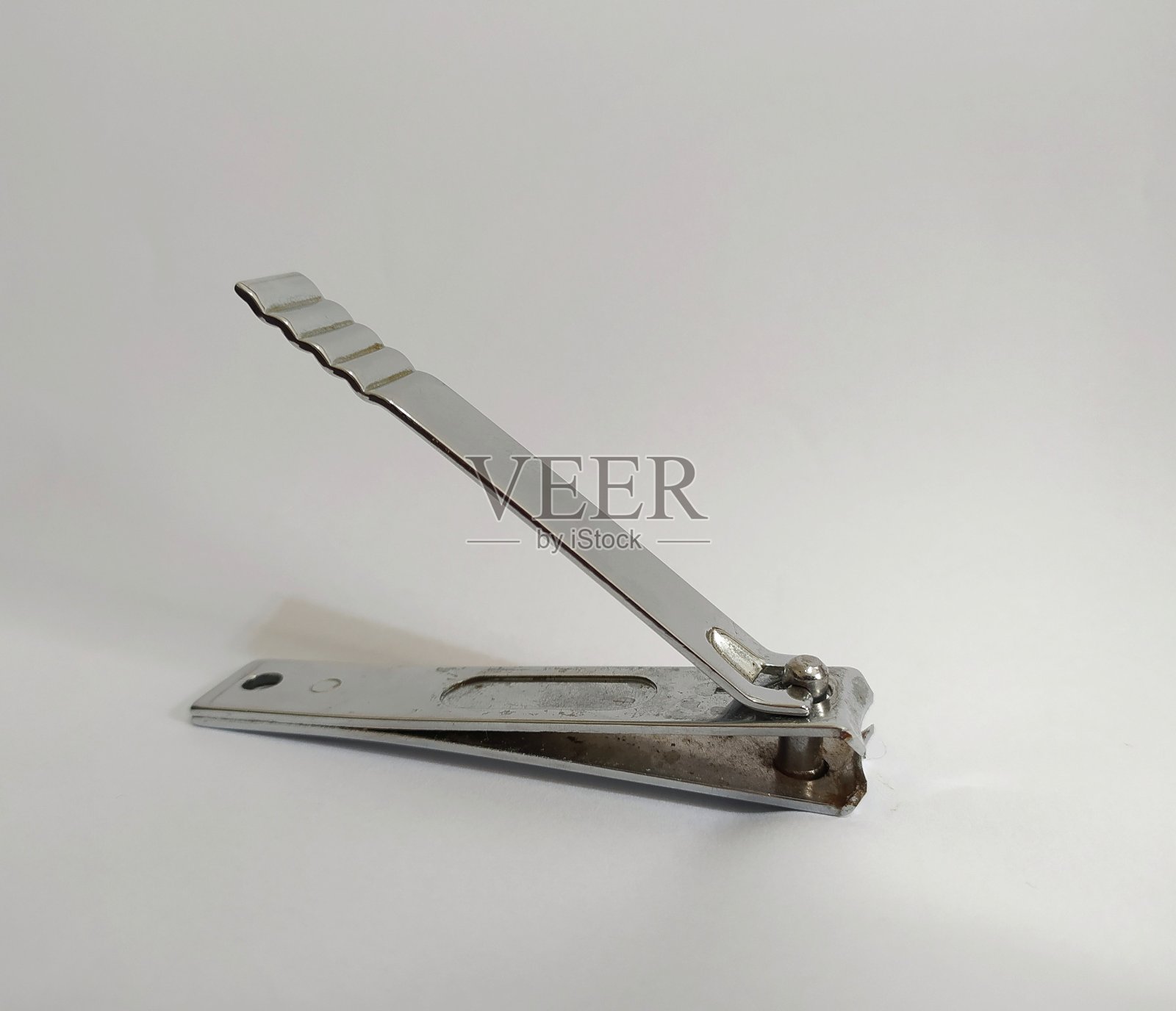 白色背景下的指甲剪照片摄影图片