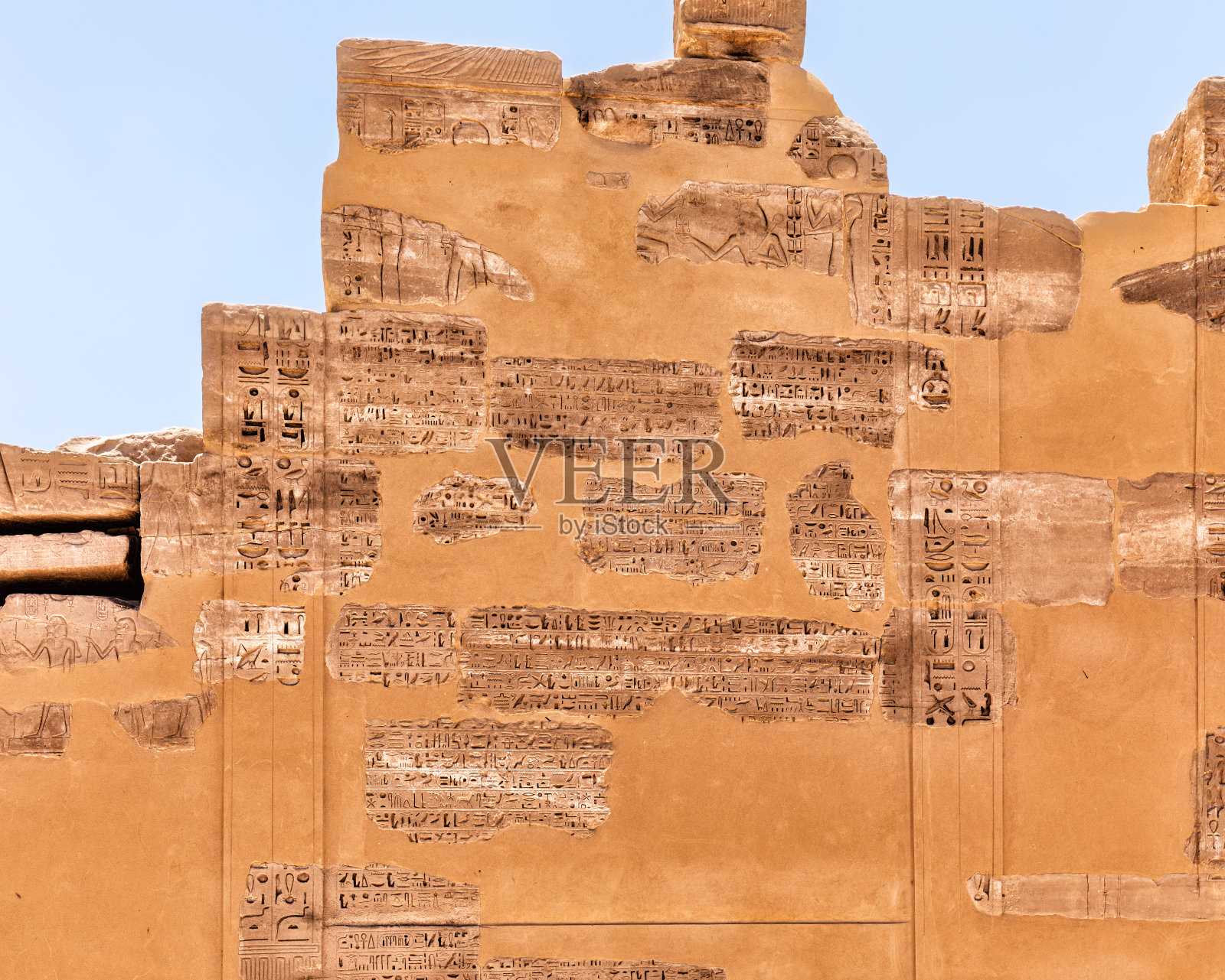 埃及卢克索卡纳克神庙塔门的古代装饰特写照片摄影图片