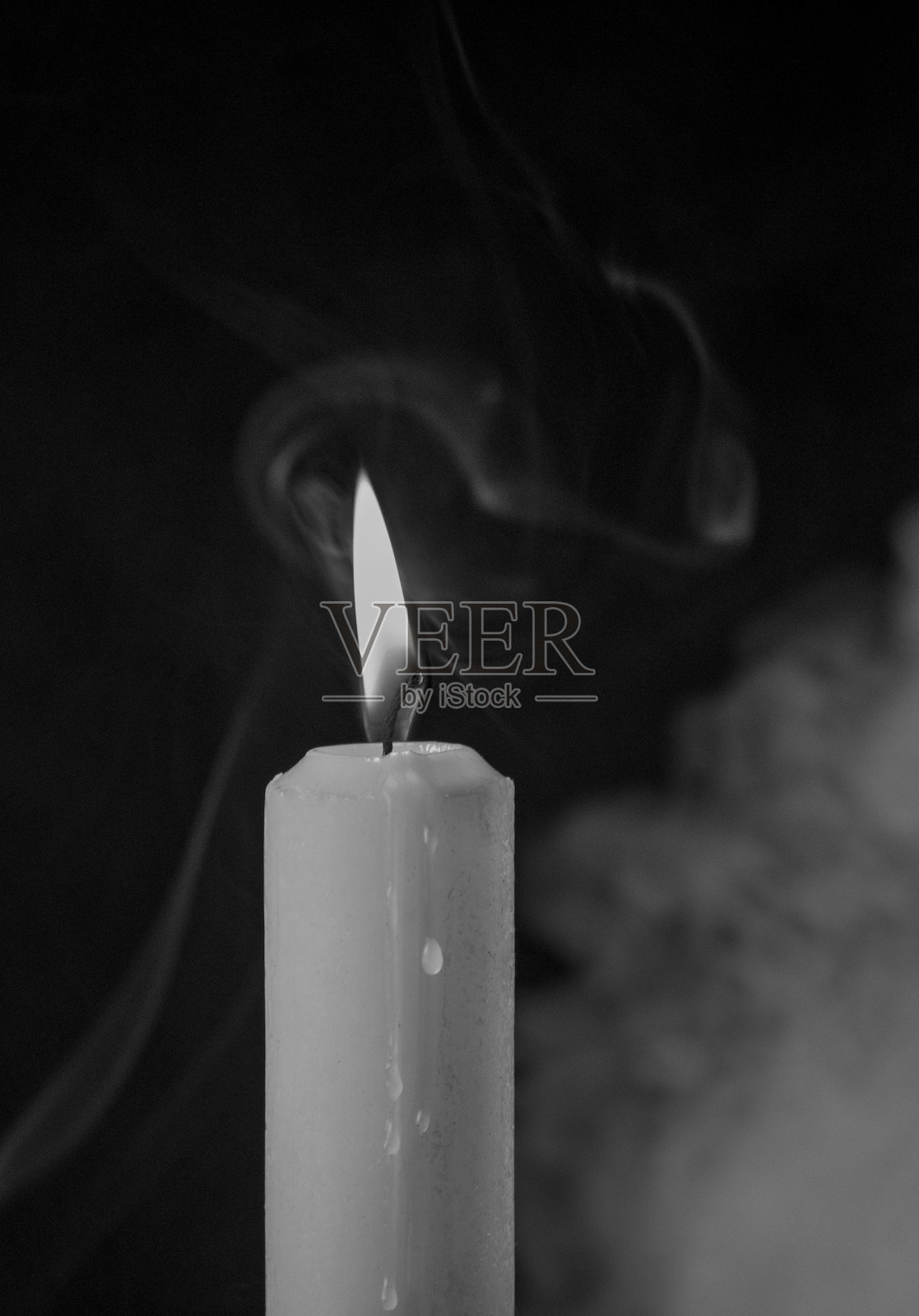 吸烟的蜡烛照片摄影图片